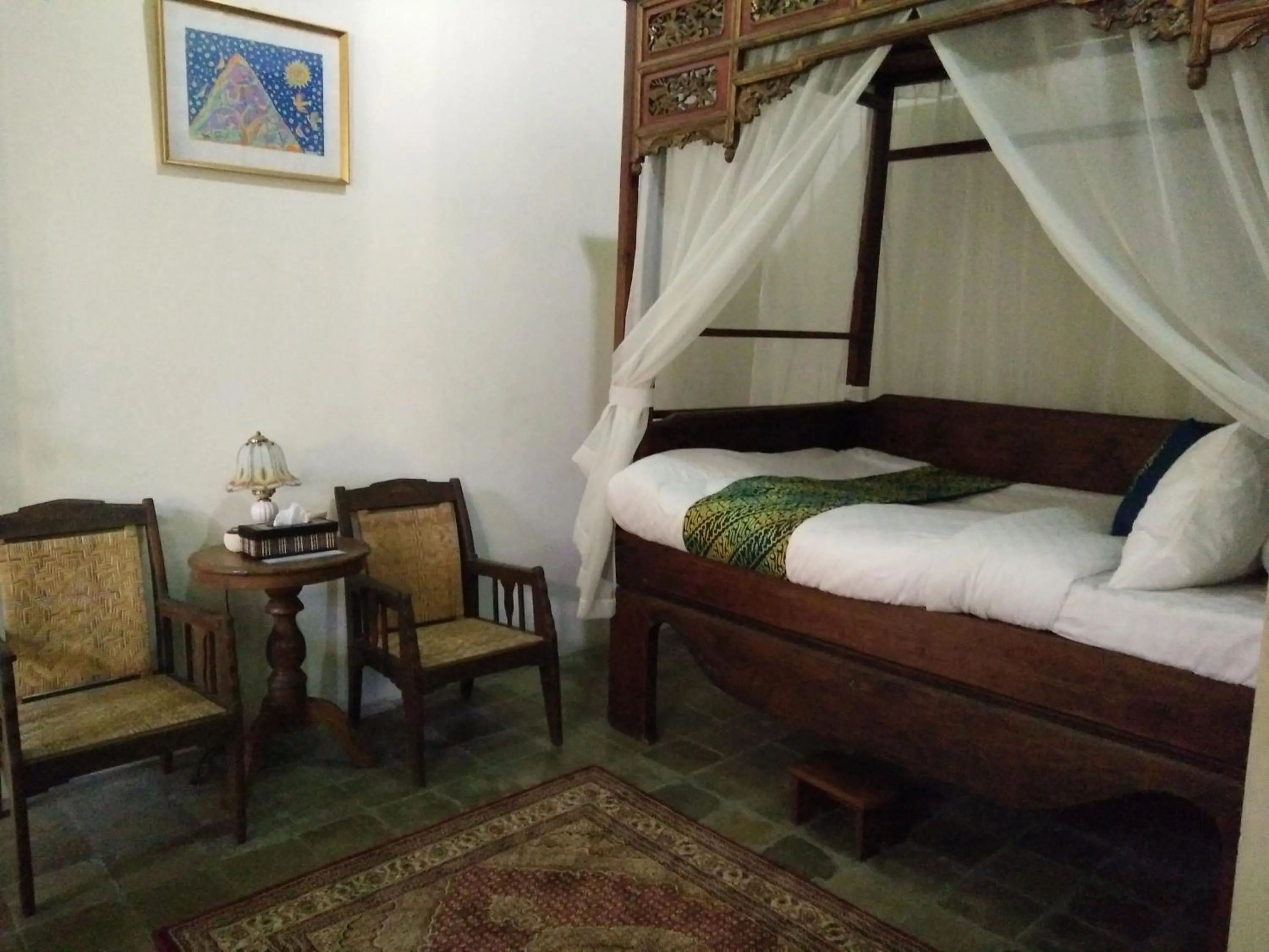 Bed in nDalem Natan Royal Heritage
