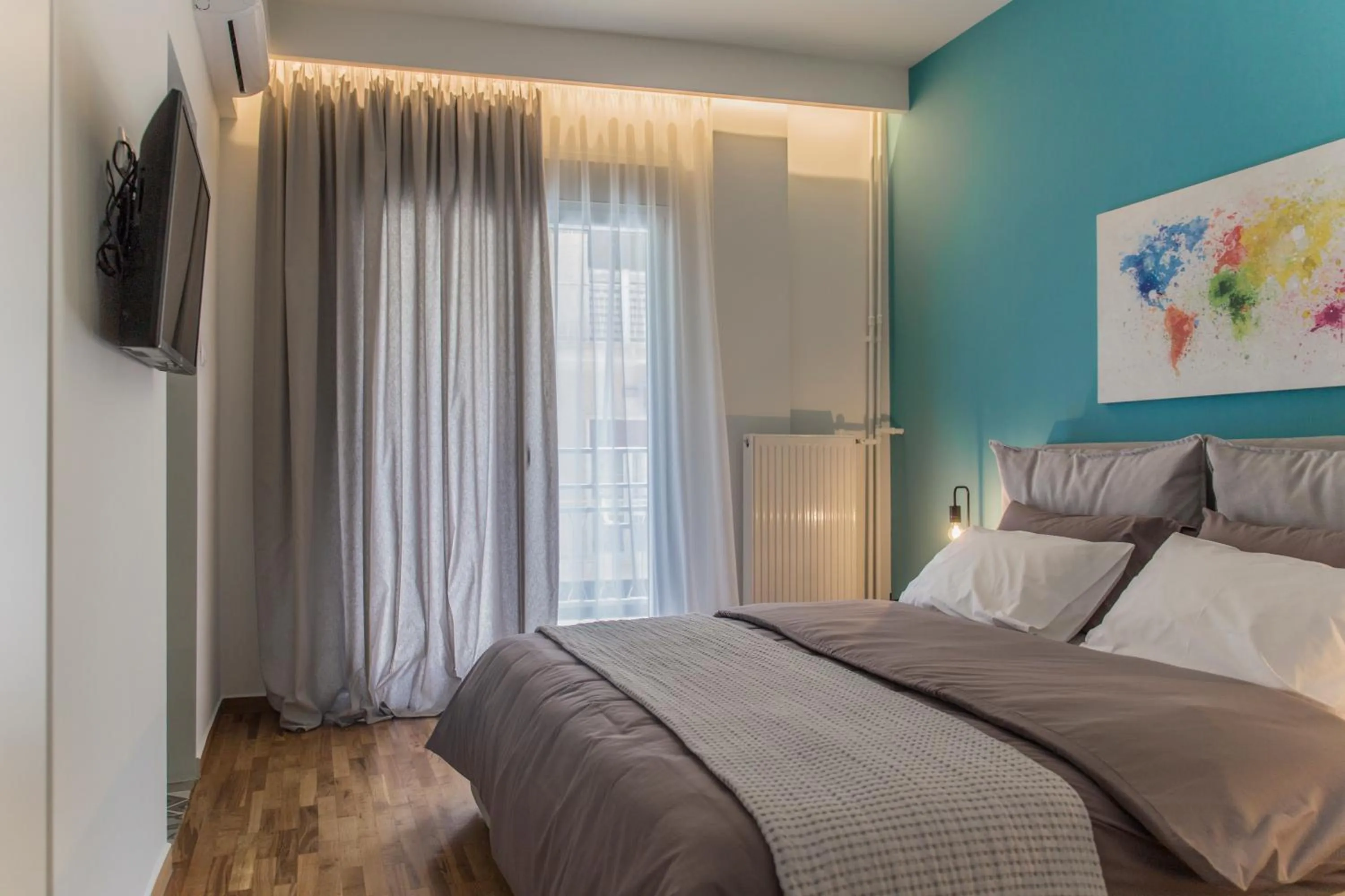 Photo of the whole room, Bed in The Athens Insider