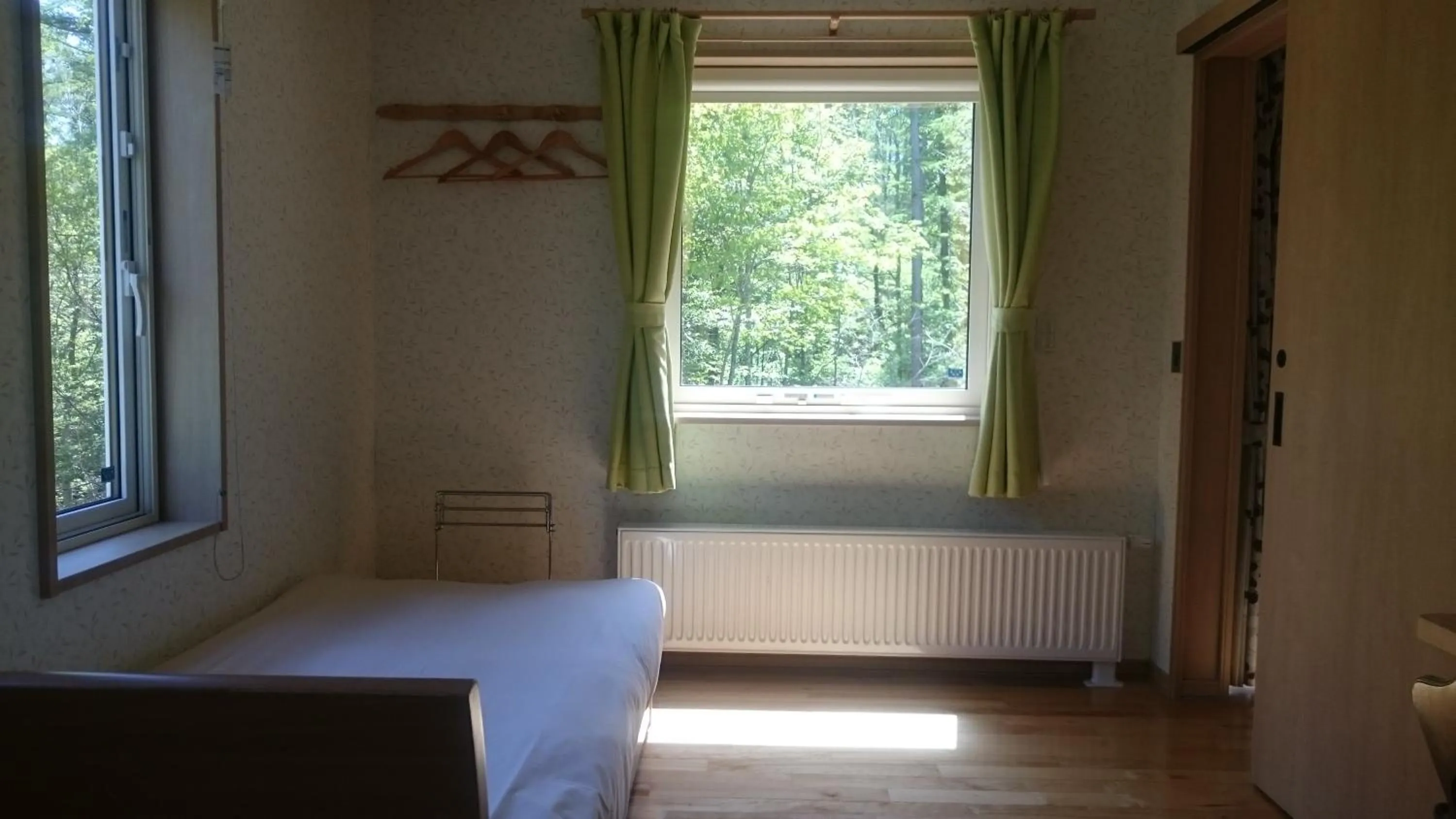 Garden view, Bed in Ituka Furano e