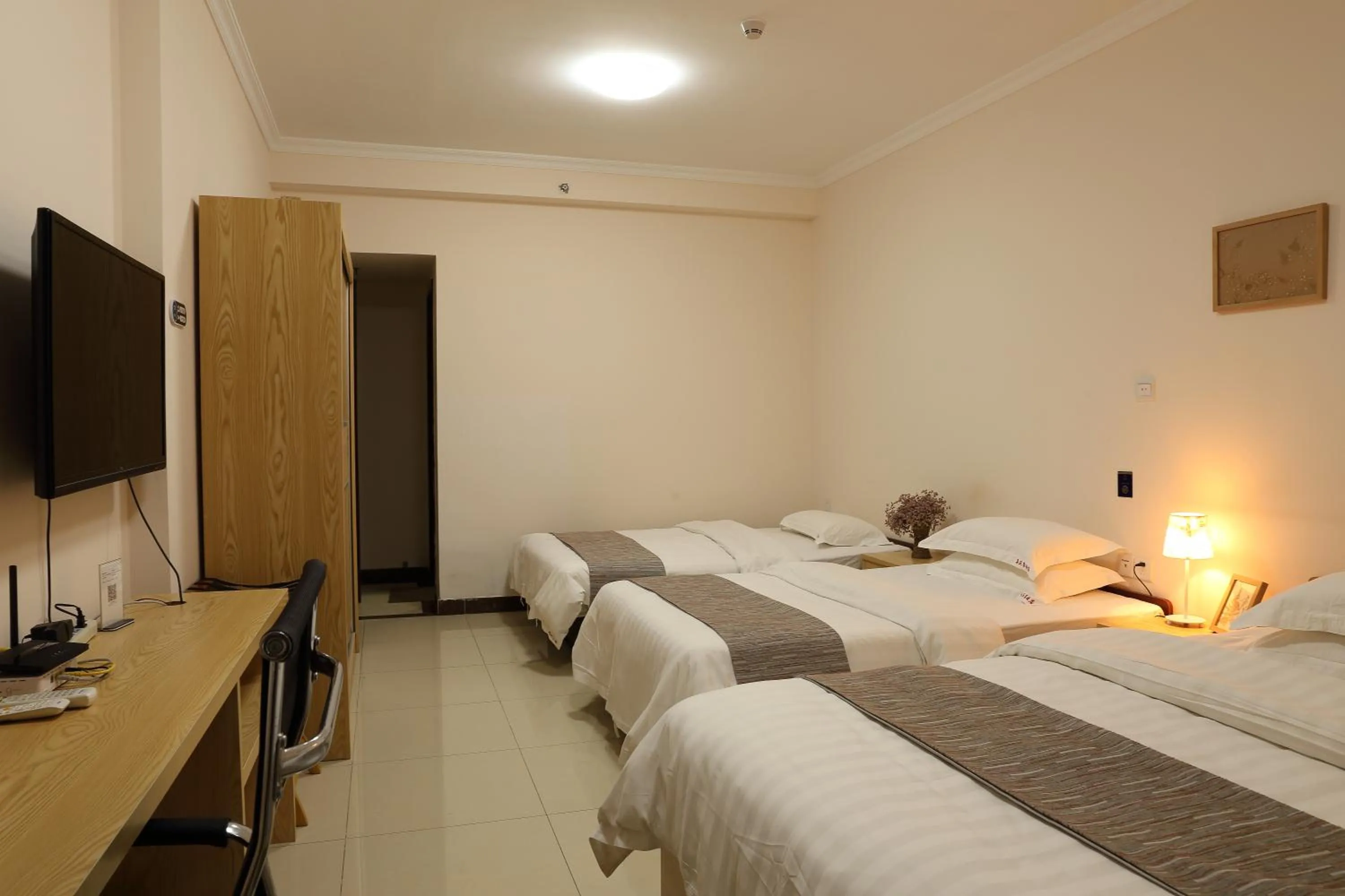 Bed in Guangzhou Convention Center Apartment