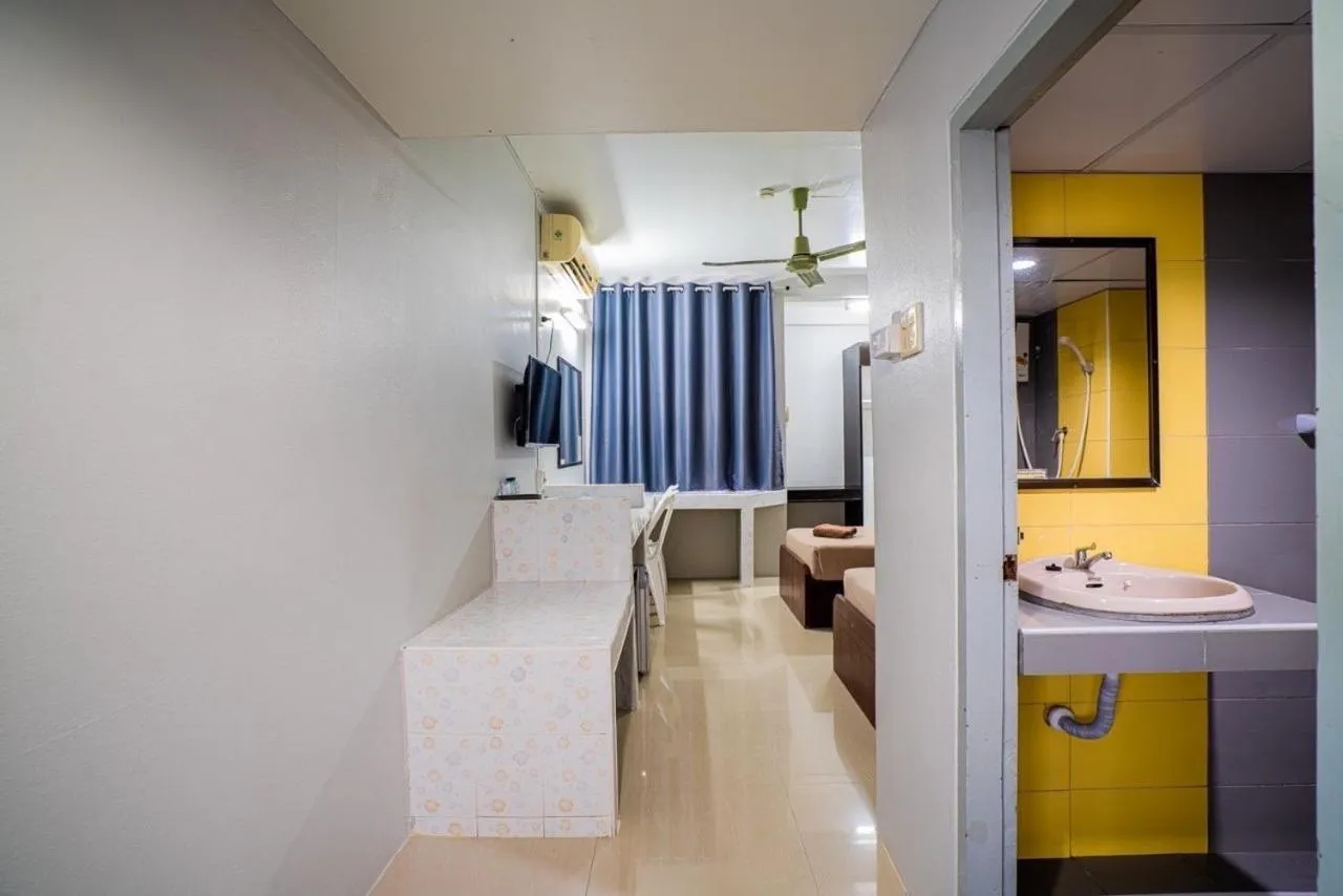 Bed in Pasawang Hotel (โรงแรมภาสว่าง)