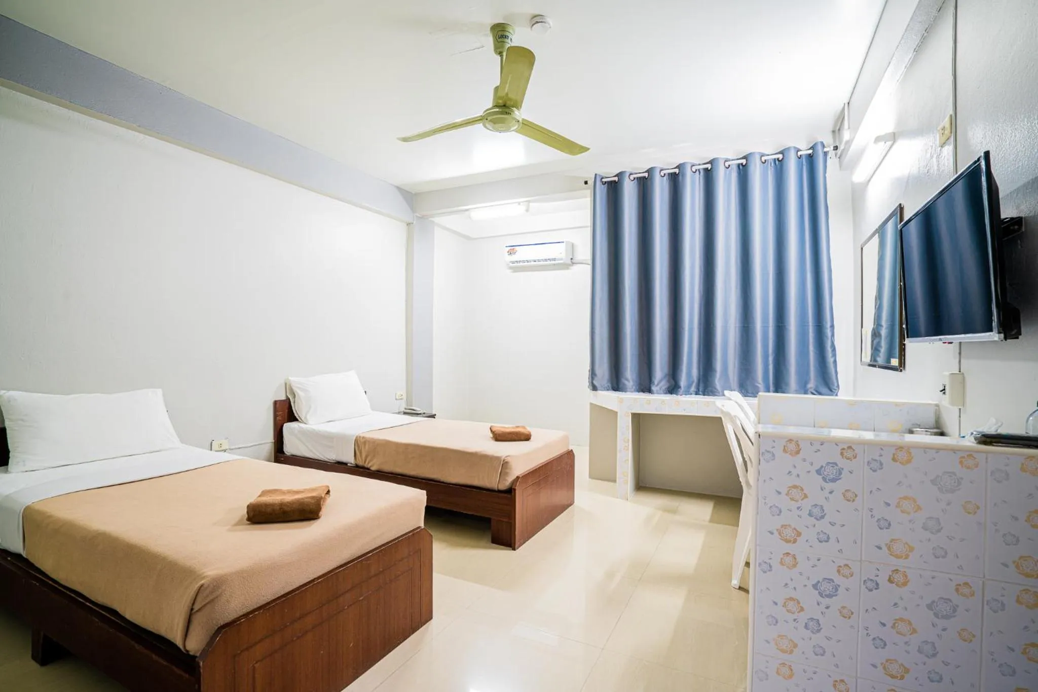 Bed in Pasawang Hotel (โรงแรมภาสว่าง)