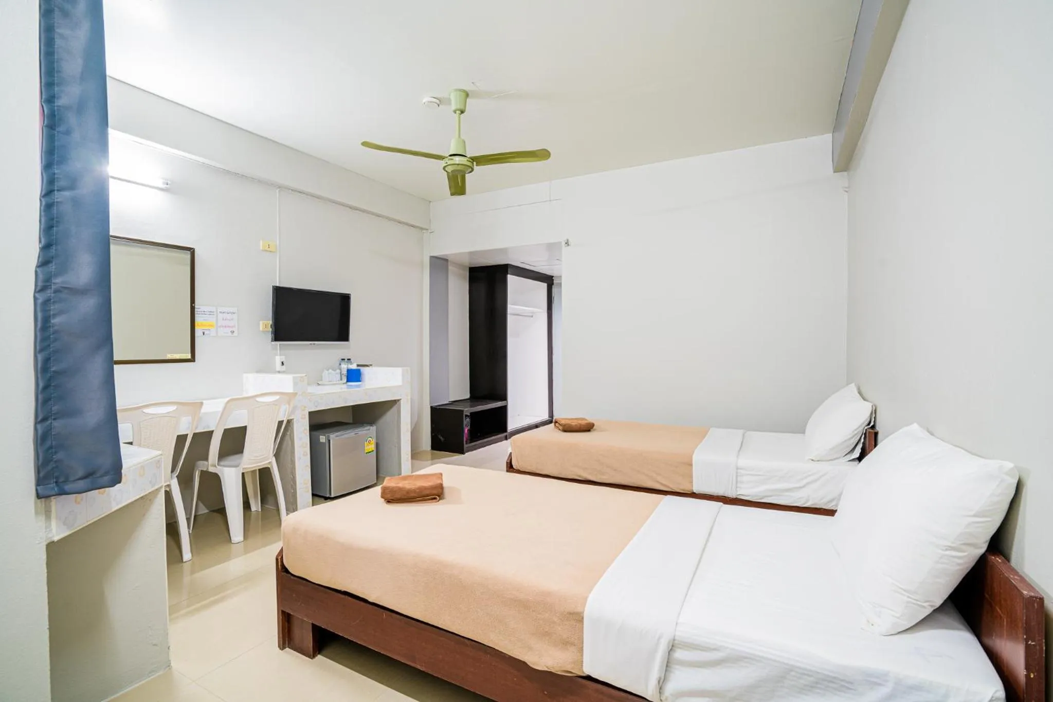 Bed in Pasawang Hotel (โรงแรมภาสว่าง)