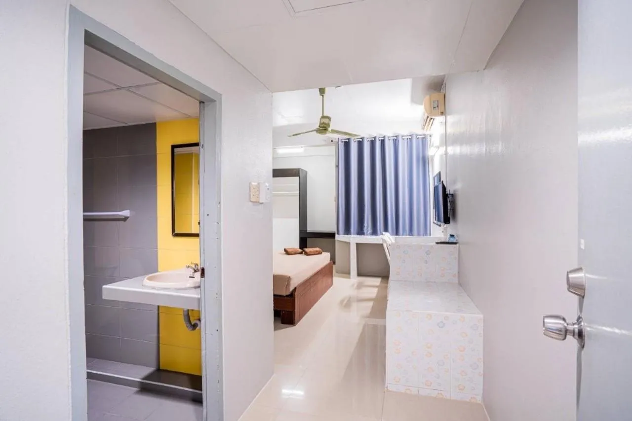 Bed in Pasawang Hotel (โรงแรมภาสว่าง)