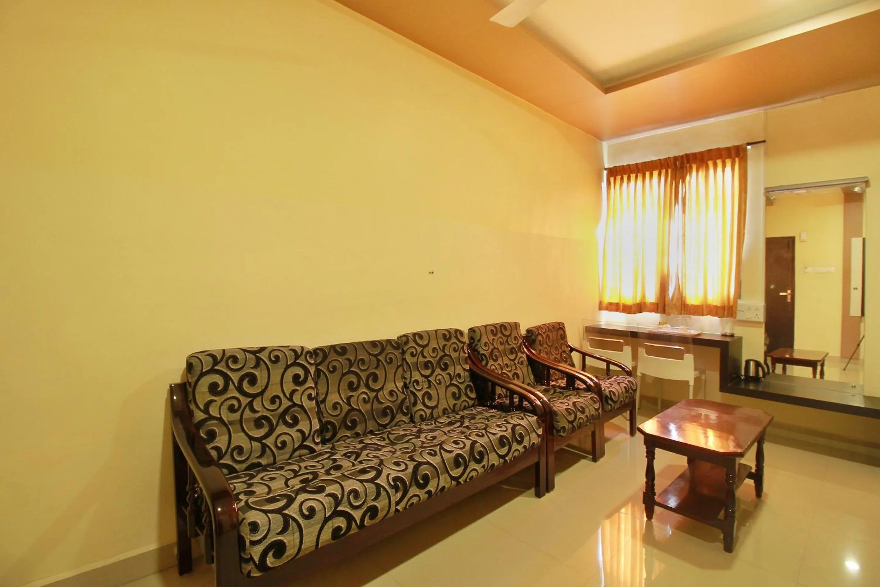 Bedroom in Capital O Rj Grand