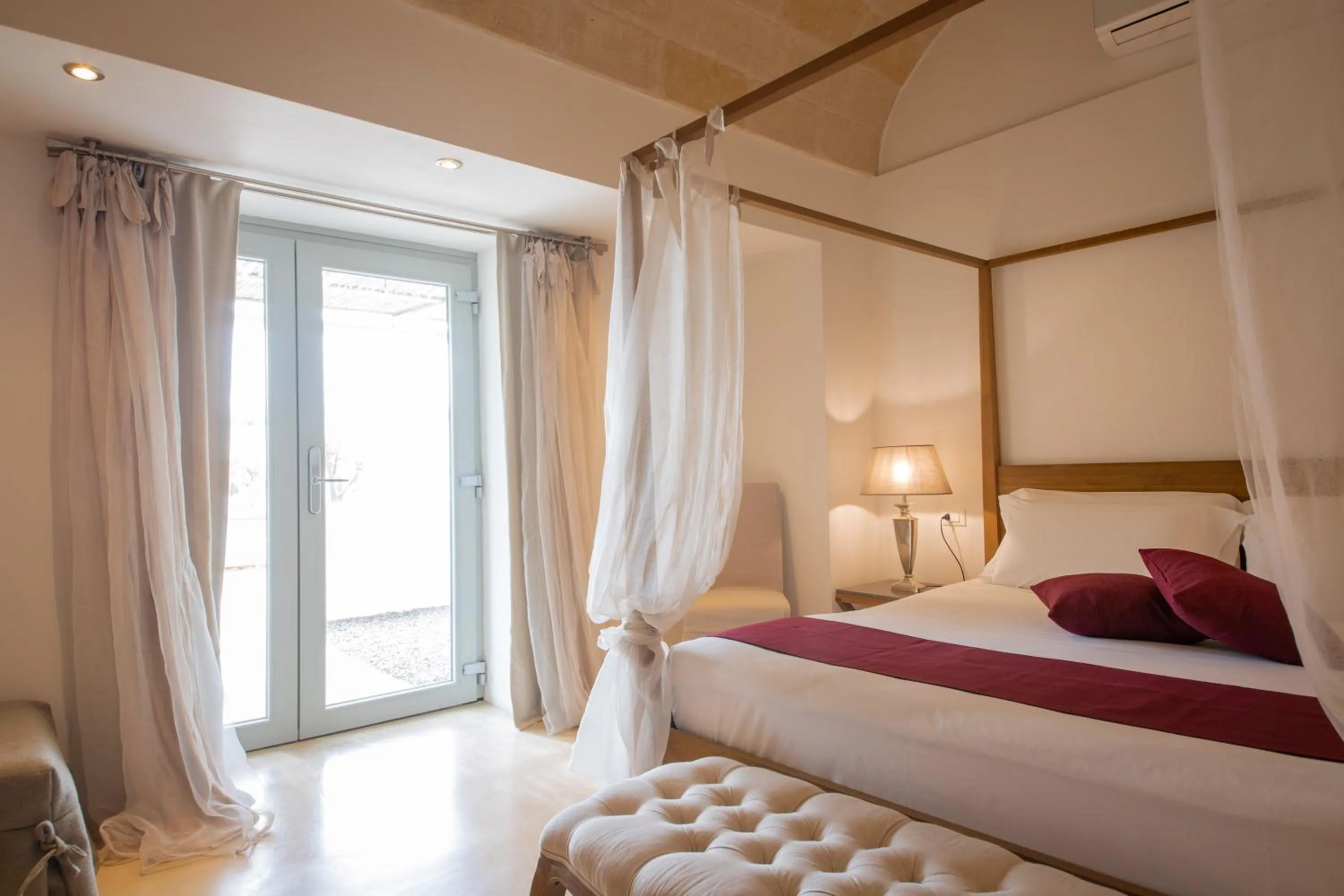 Bed in Masseriola Antiche Fogge by Apulia Hospitality