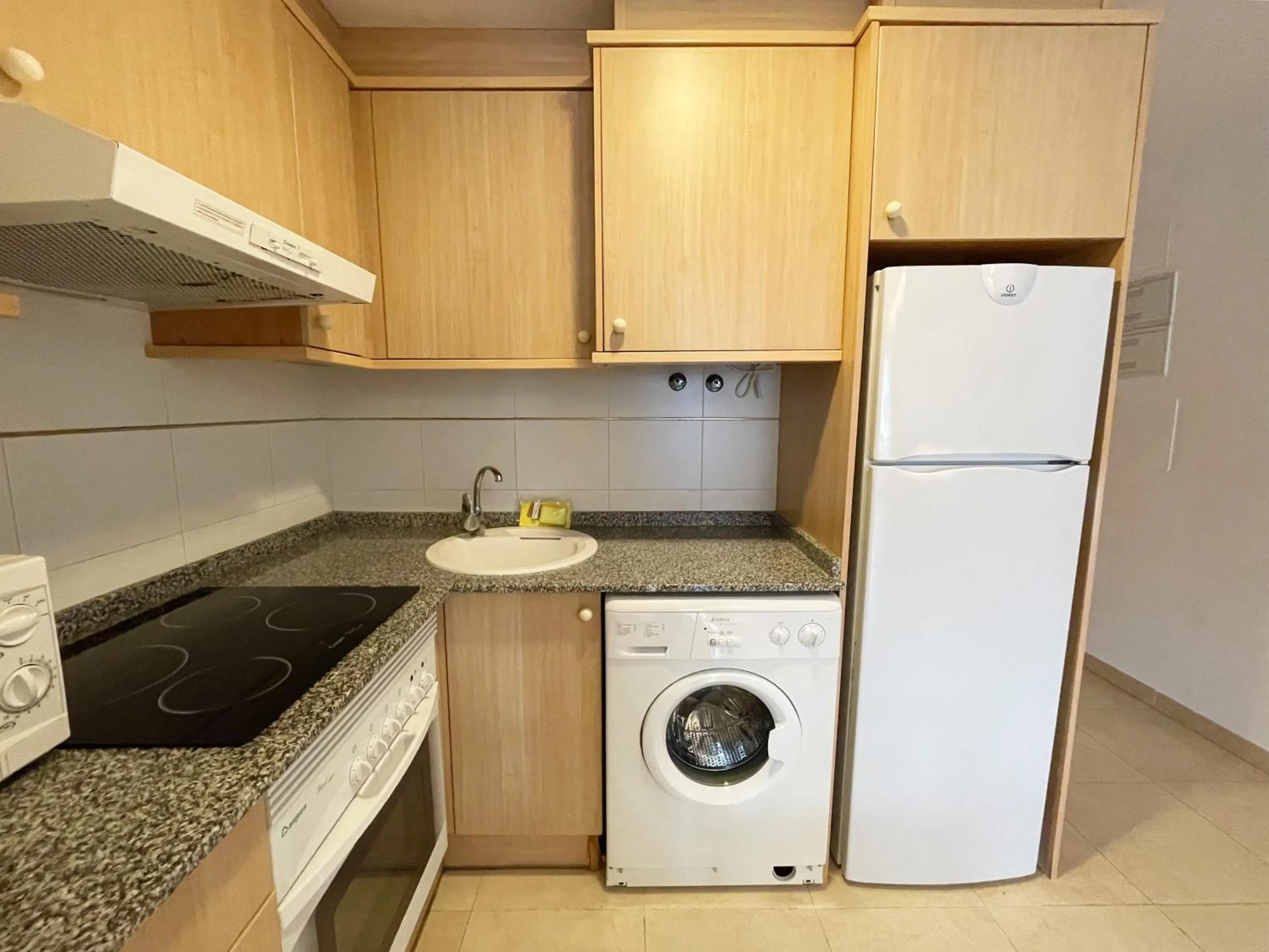 Kitchen or kitchenette in Apartamentos Los Almendros 3000