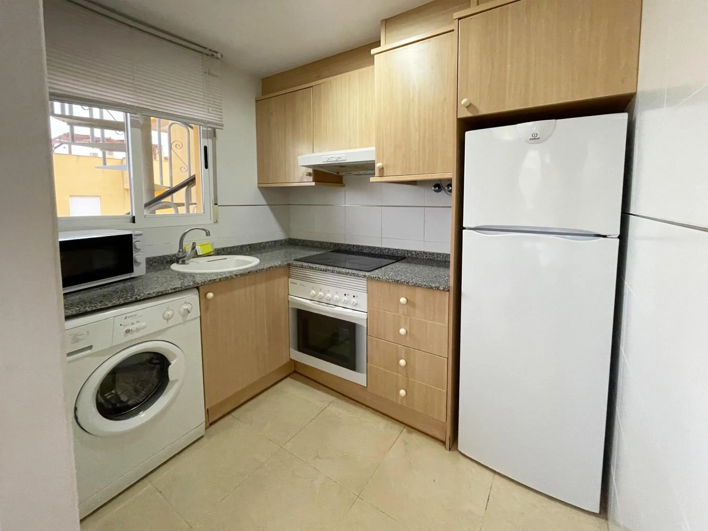 Kitchen or kitchenette in Apartamentos Los Almendros 3000