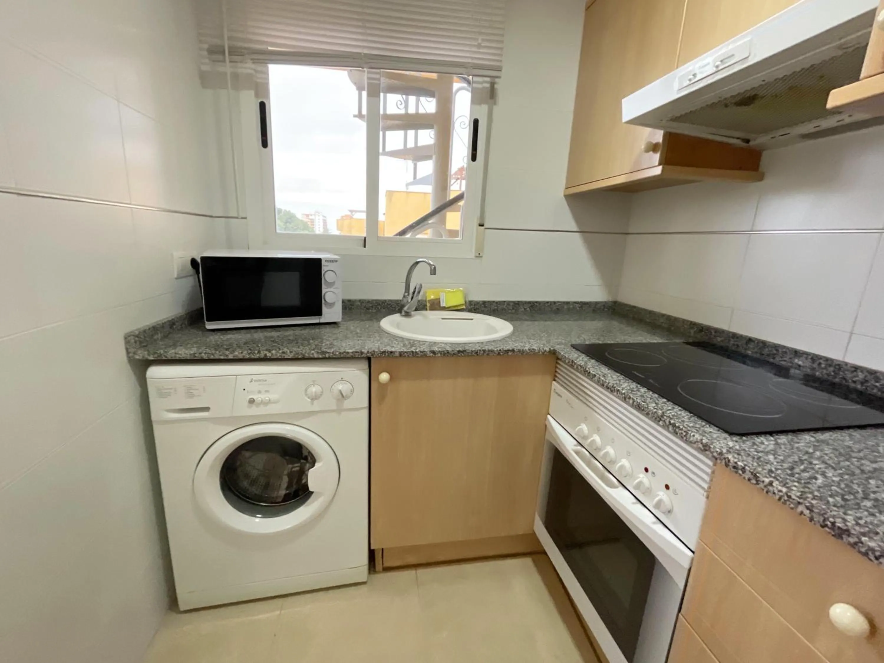 Kitchen or kitchenette in Apartamentos Los Almendros 3000