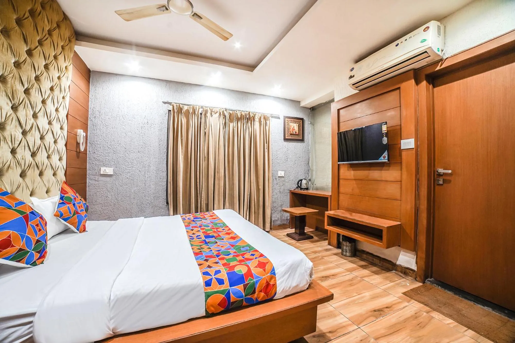 Bed in FabHotel Johri Regency
