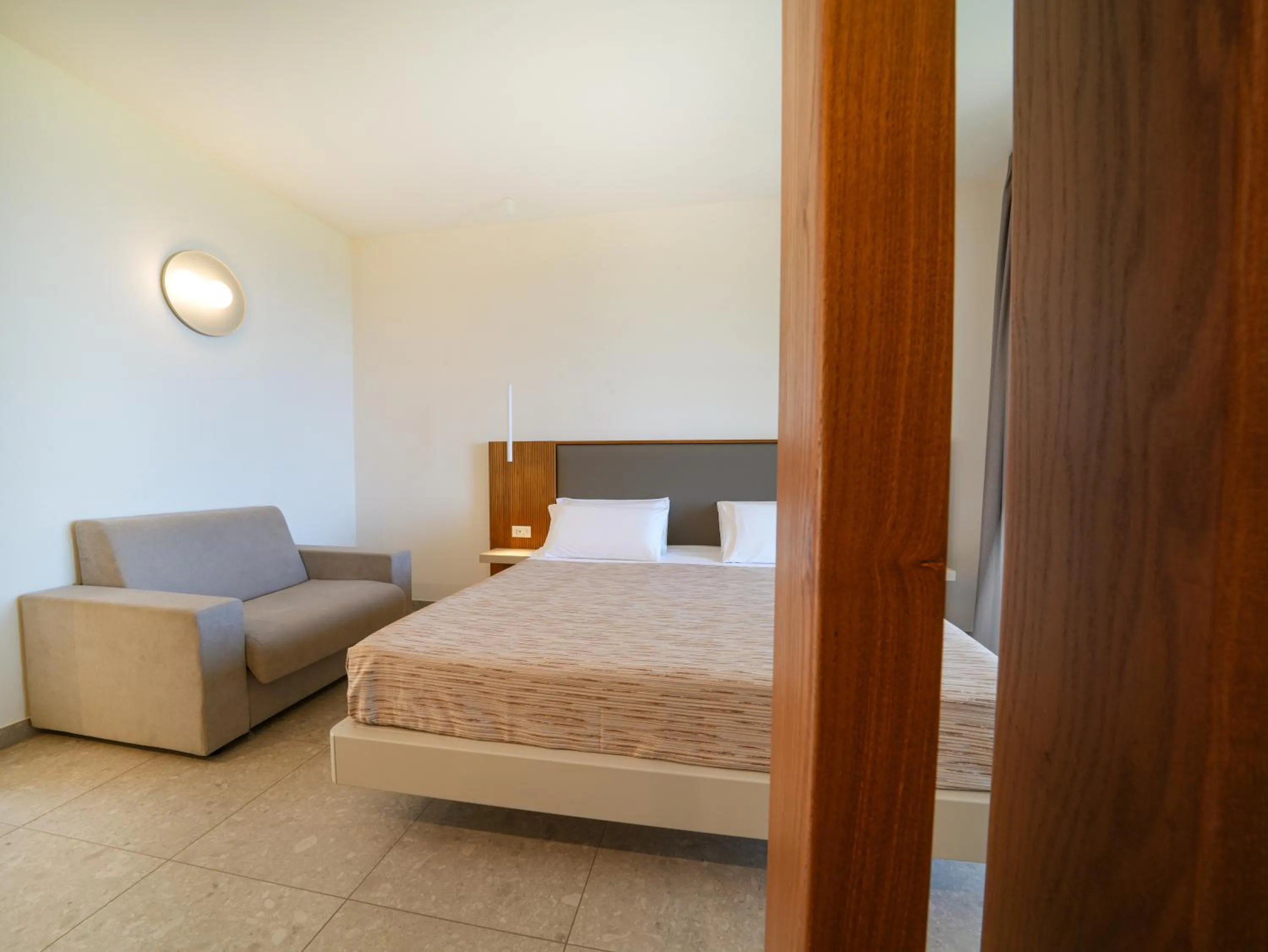 Photo of the whole room, Bed in LUZIA AGRIRESORT - Piscina Idromassaggio con Vista Mare Aperta fino alle ore 23-00