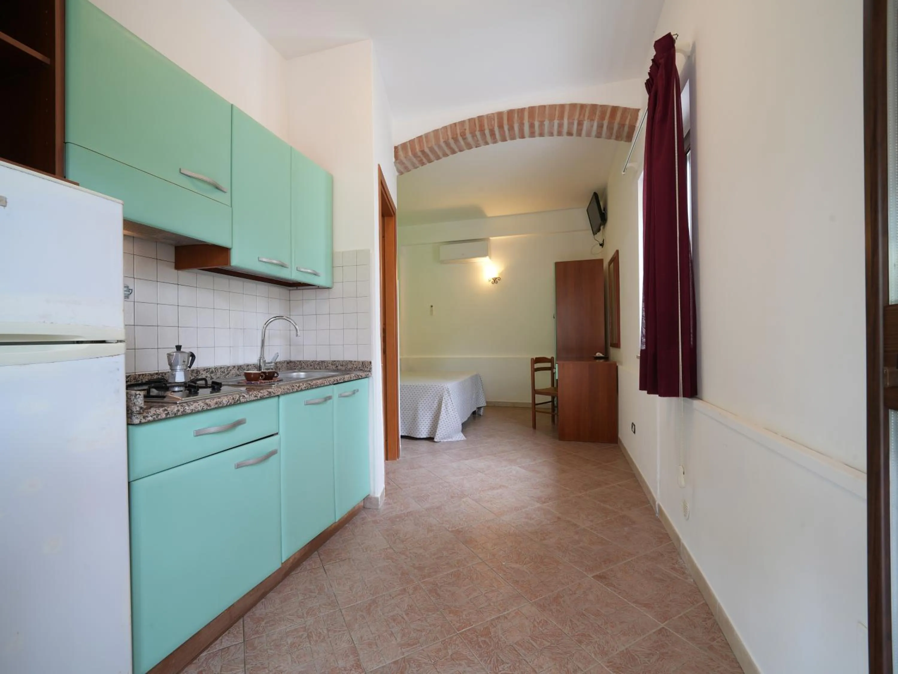 Kitchen or kitchenette in LUZIA AGRIRESORT - Piscina Idromassaggio con Vista Mare Aperta fino alle ore 23-00