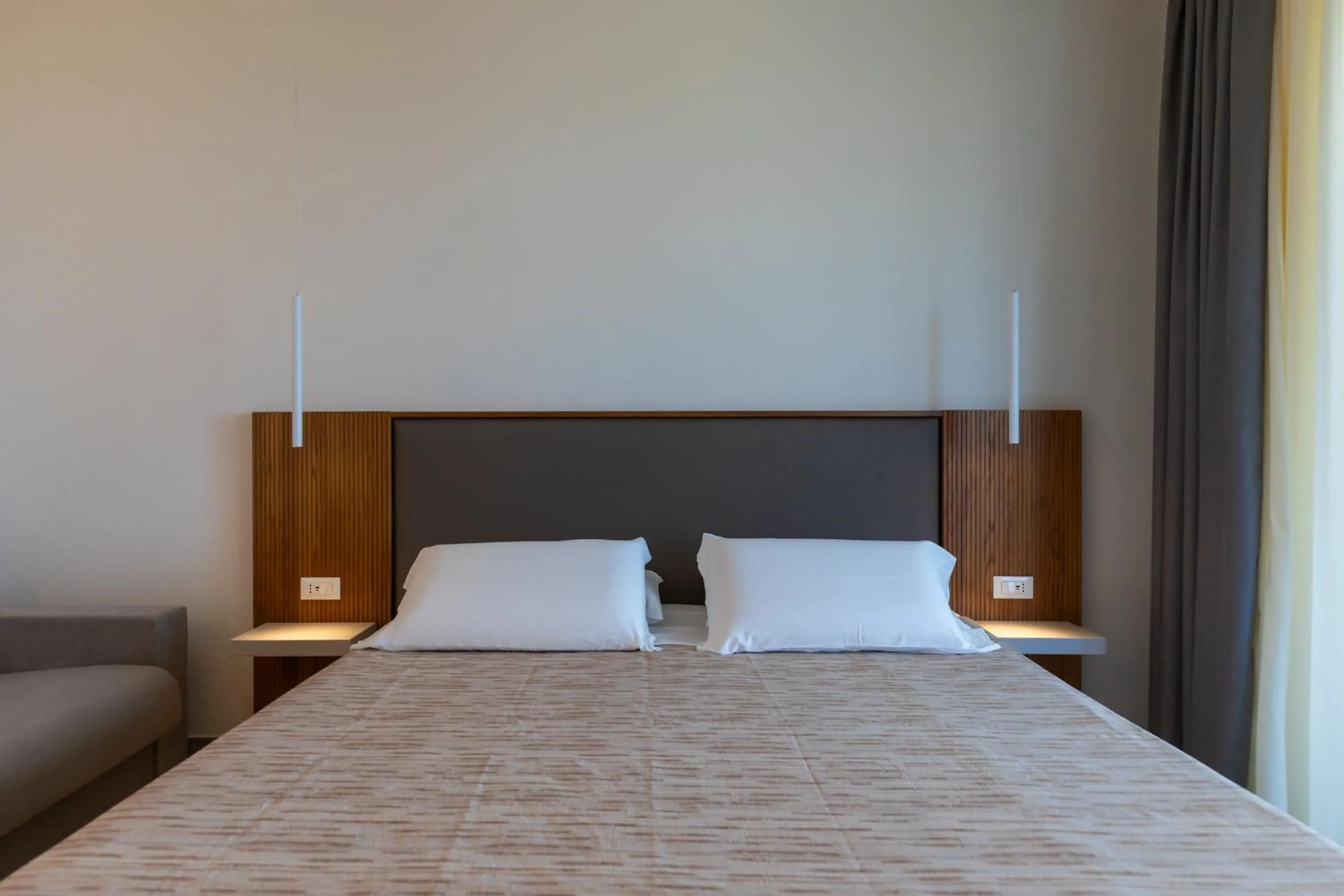 Photo of the whole room, Bed in LUZIA AGRIRESORT - Piscina Idromassaggio con Vista Mare Aperta fino alle ore 23-00