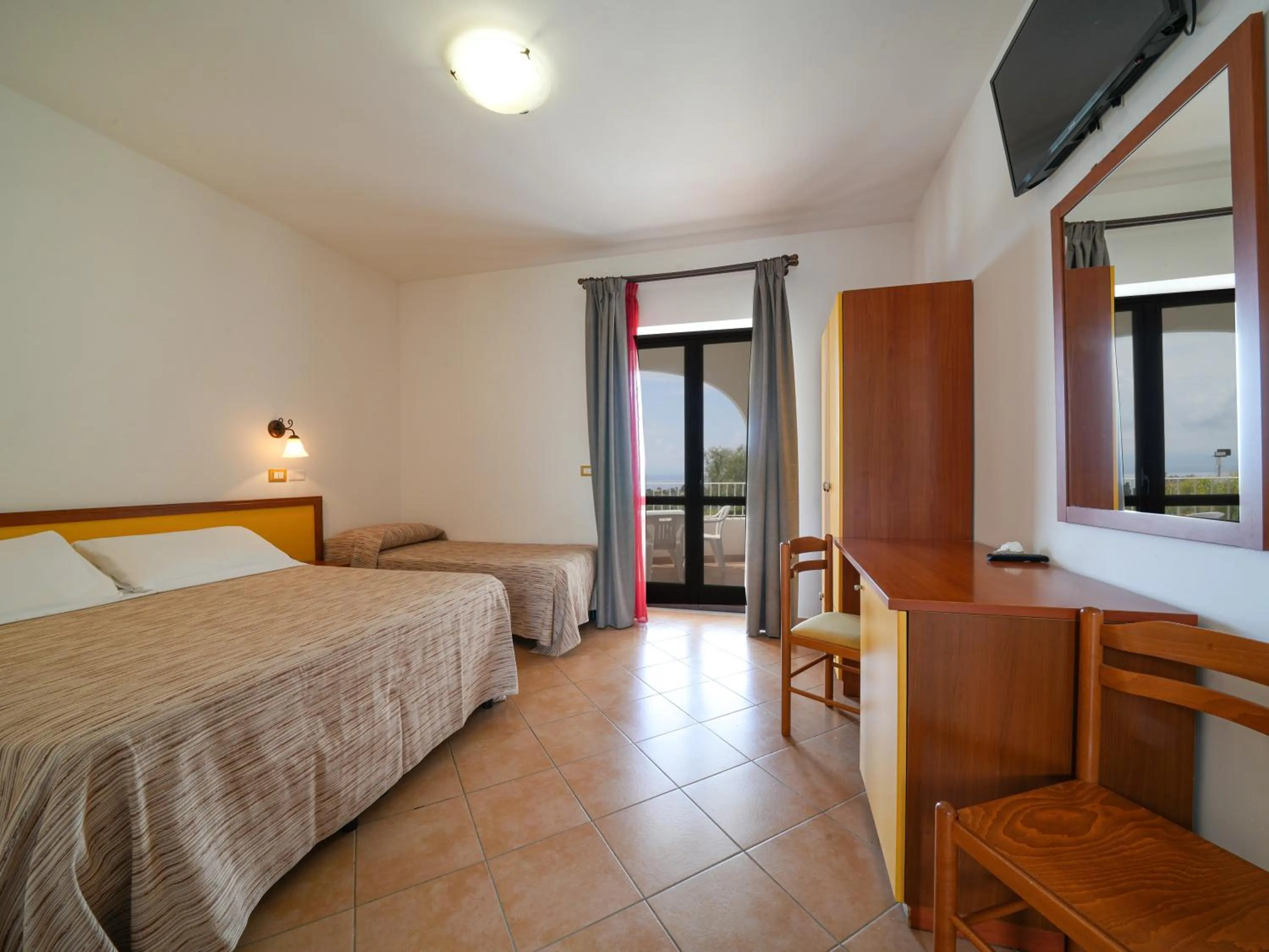 Photo of the whole room, Bed in LUZIA AGRIRESORT - Piscina Idromassaggio con Vista Mare Aperta fino alle ore 23-00