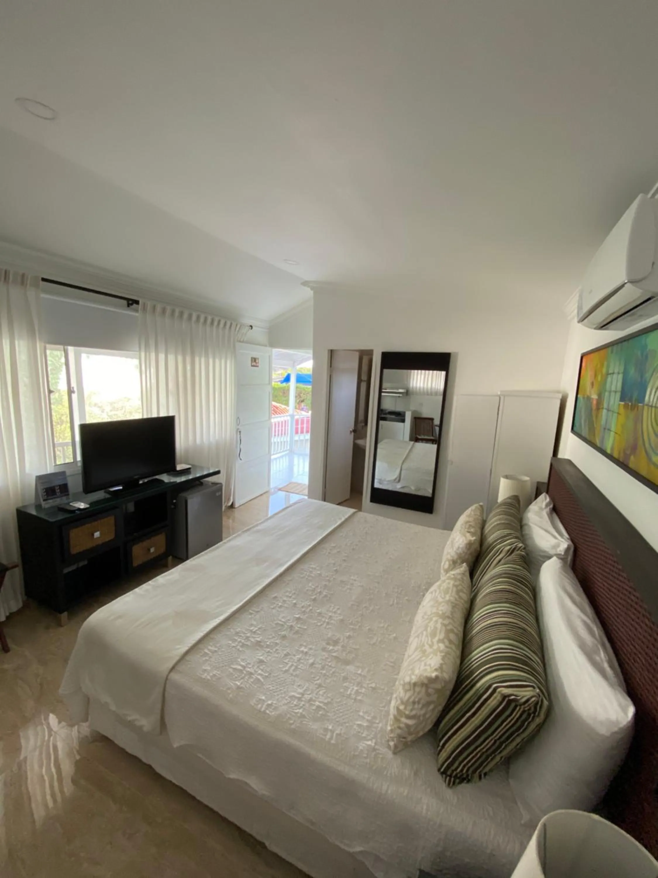 Photo of the whole room, Bed in Red Ground Village