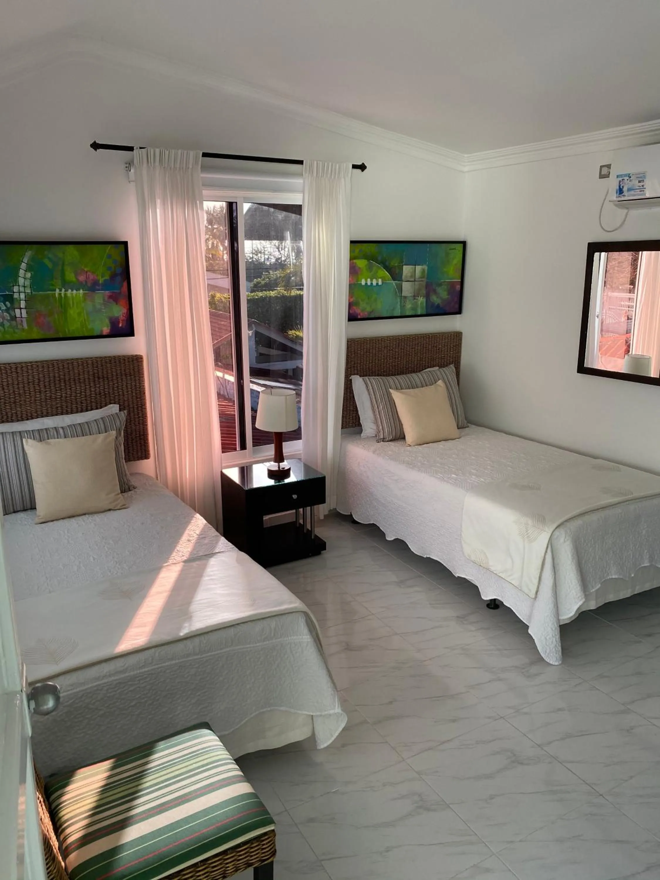 Photo of the whole room, Bed in Red Ground Village