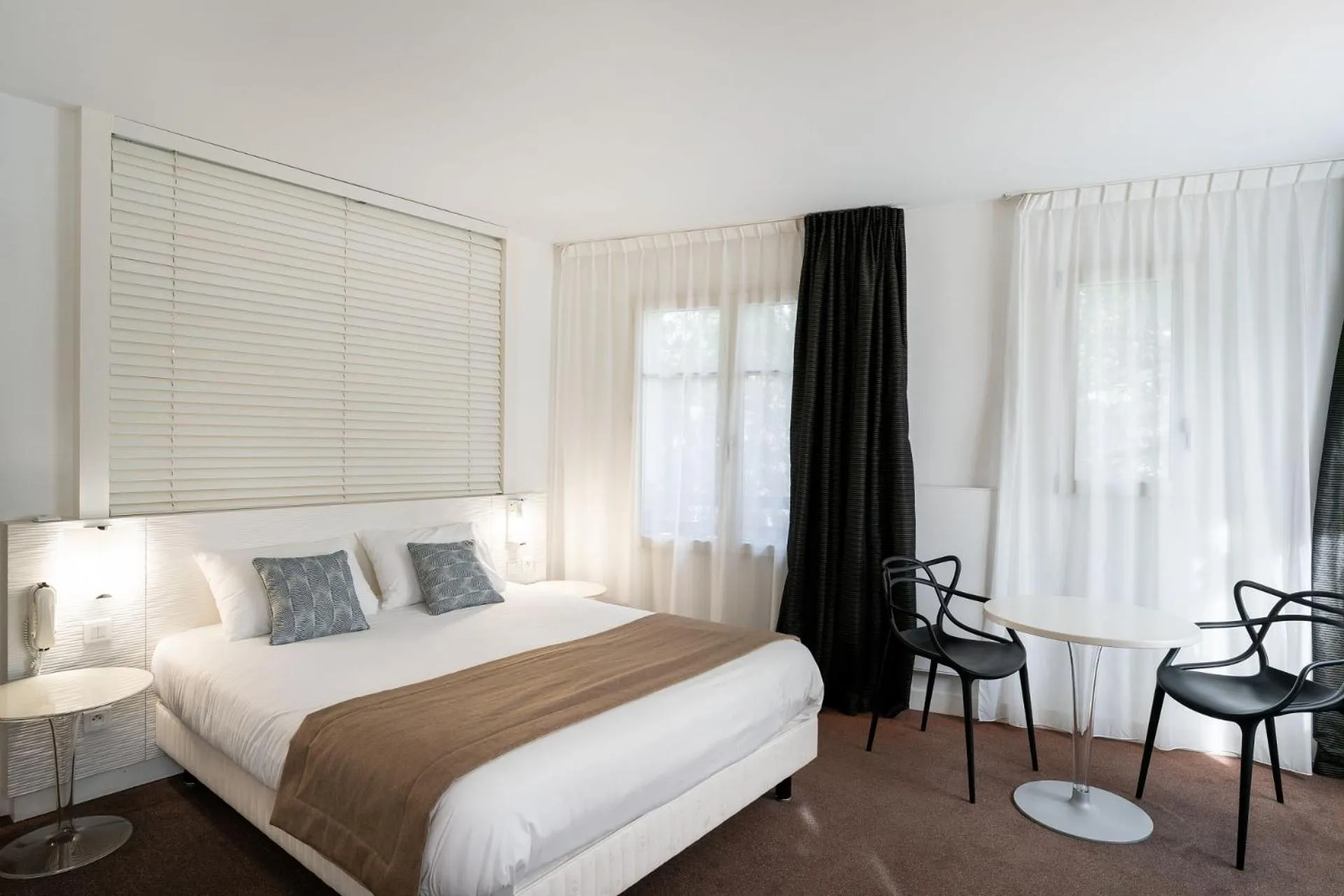 Bed in Hôtel Miléade Les Pléïades La Baule