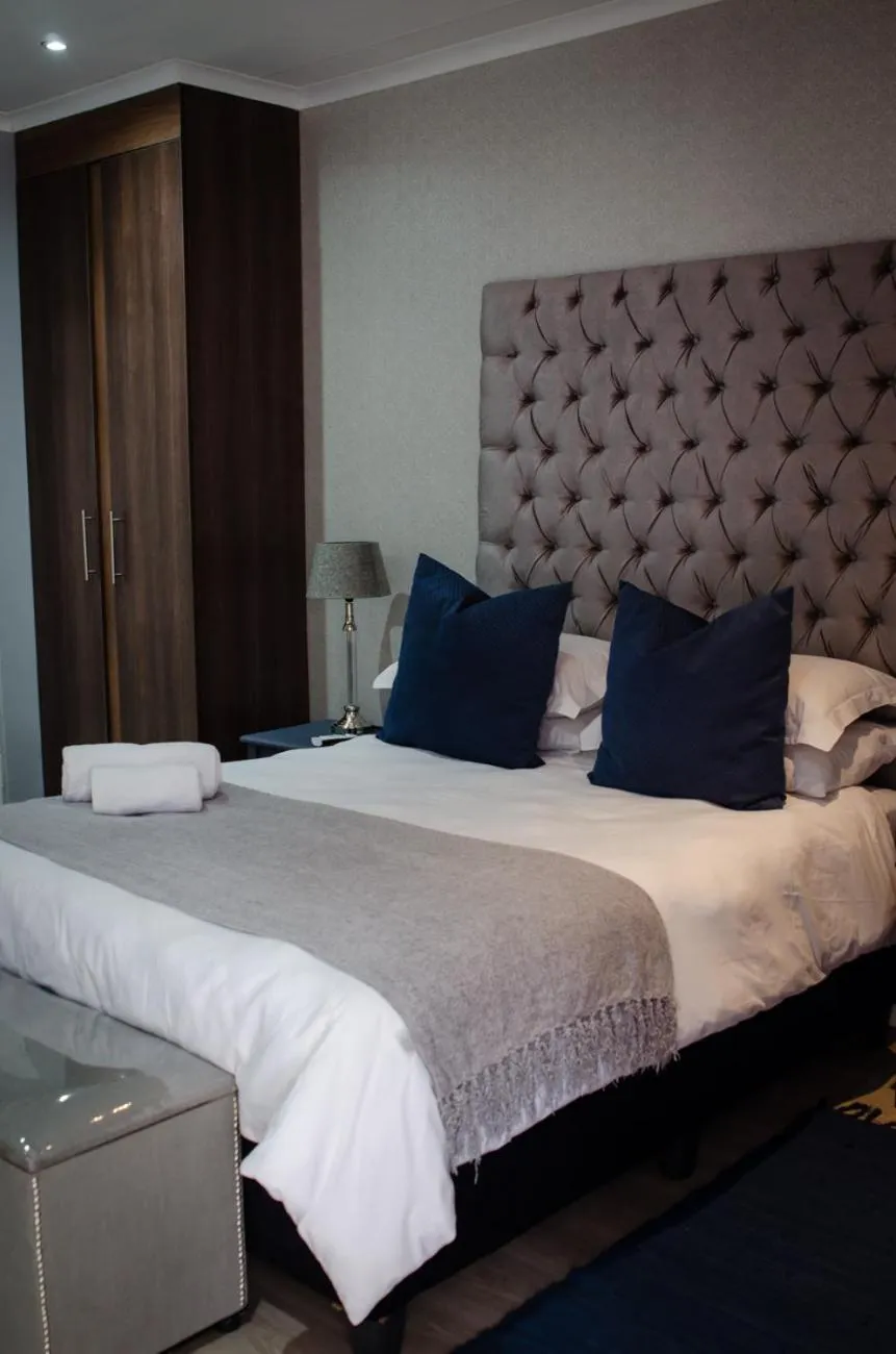 Bed in The Royal Guest House