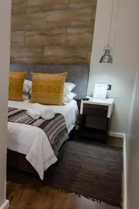 Bed in The Royal Guest House