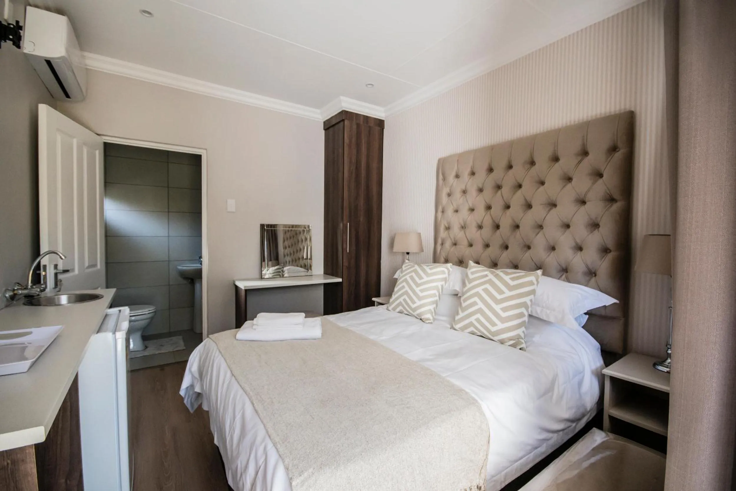 Bed in The Royal Guest House