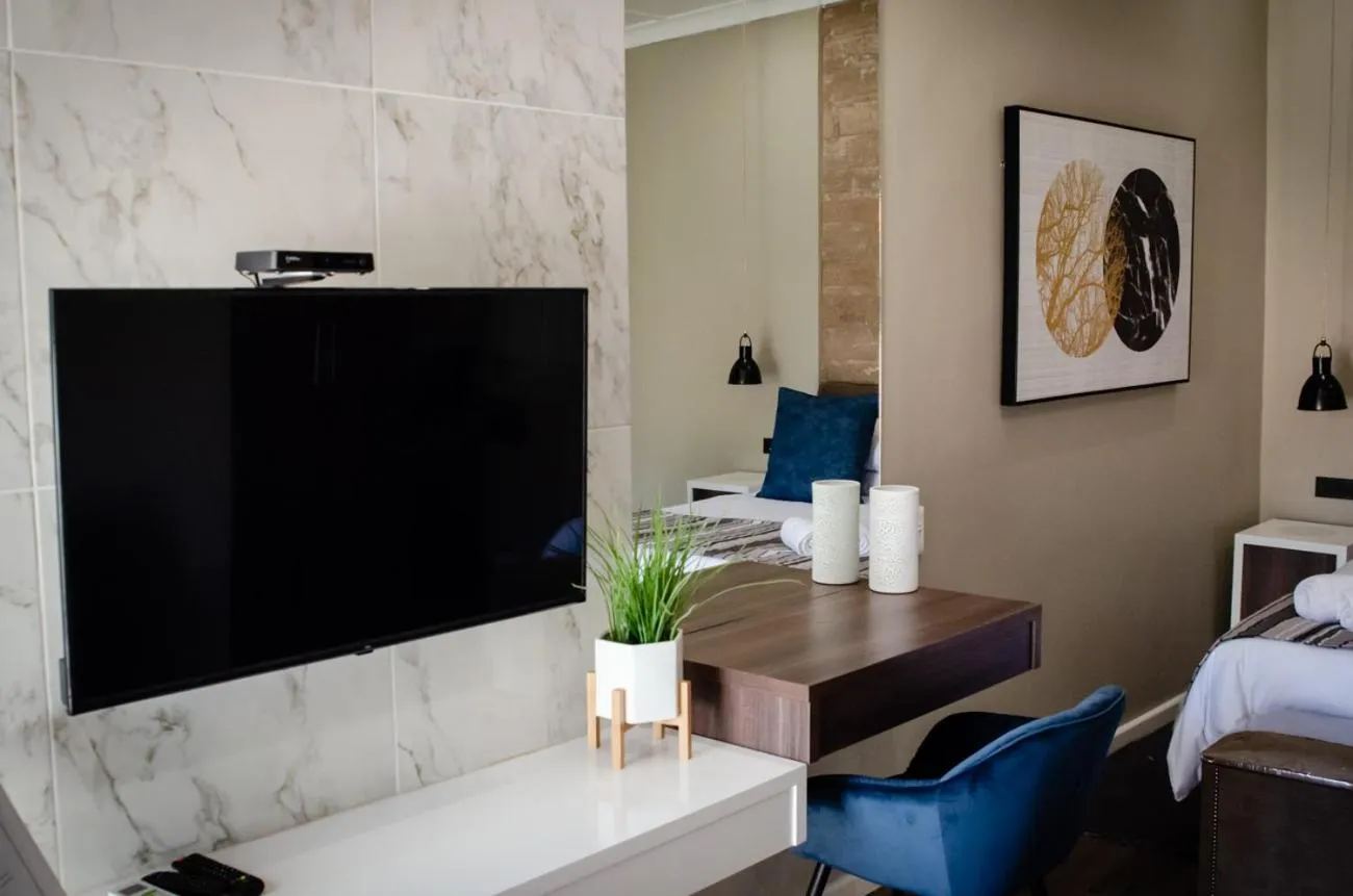 Bed in The Royal Guest House