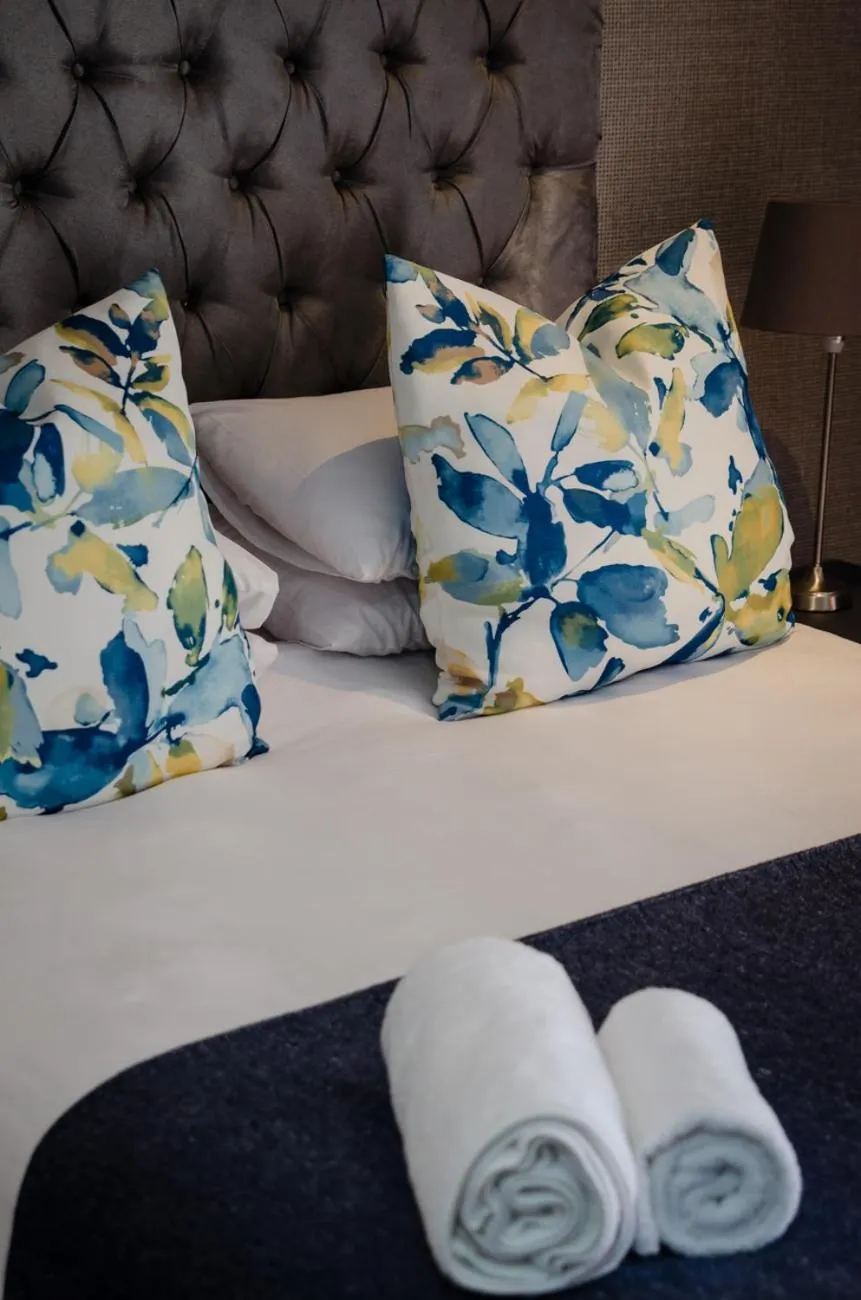 Bed in The Royal Guest House