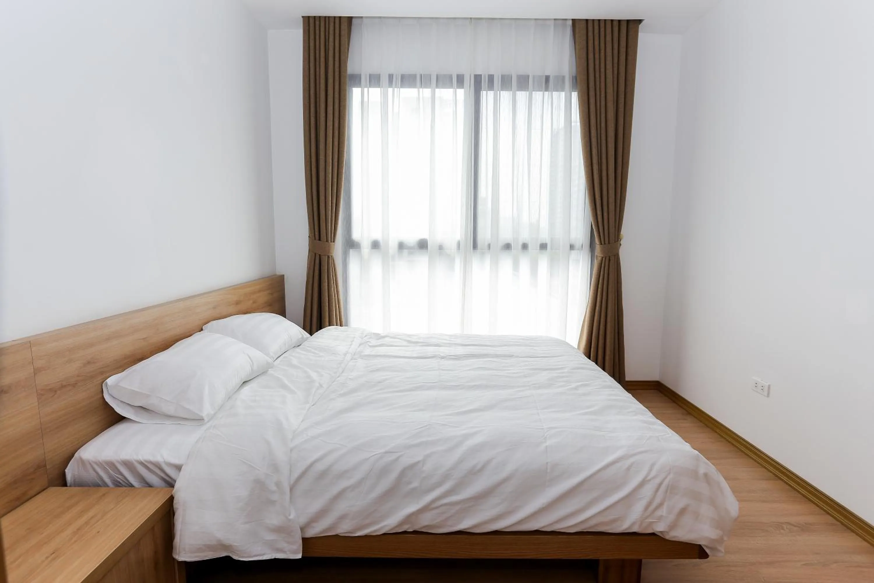 Bed in Quiet Hoang Quoc Viet Hotel & apartment