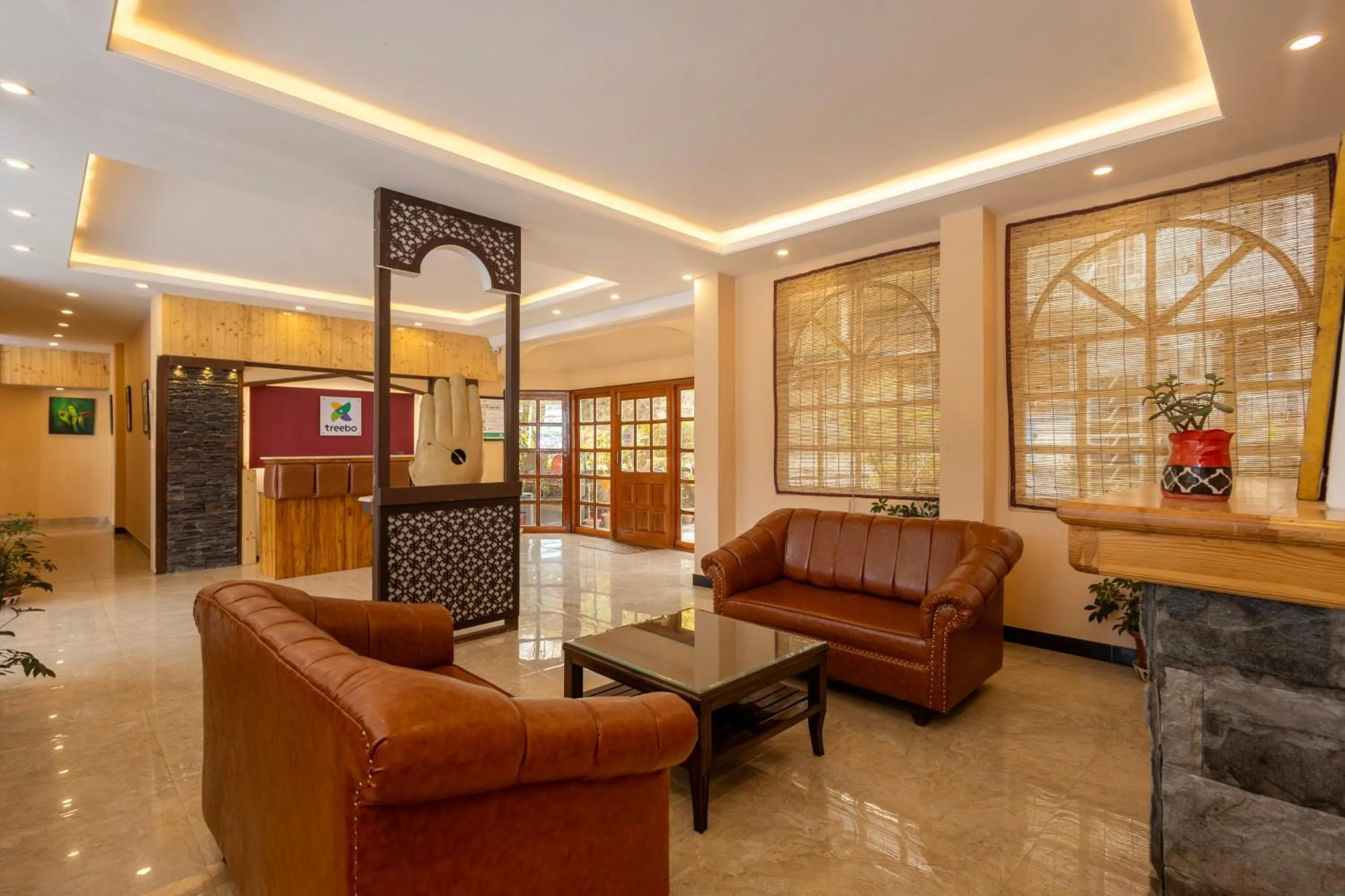 Seating area in Treebo Lords Garden Glory With Centralised Heating