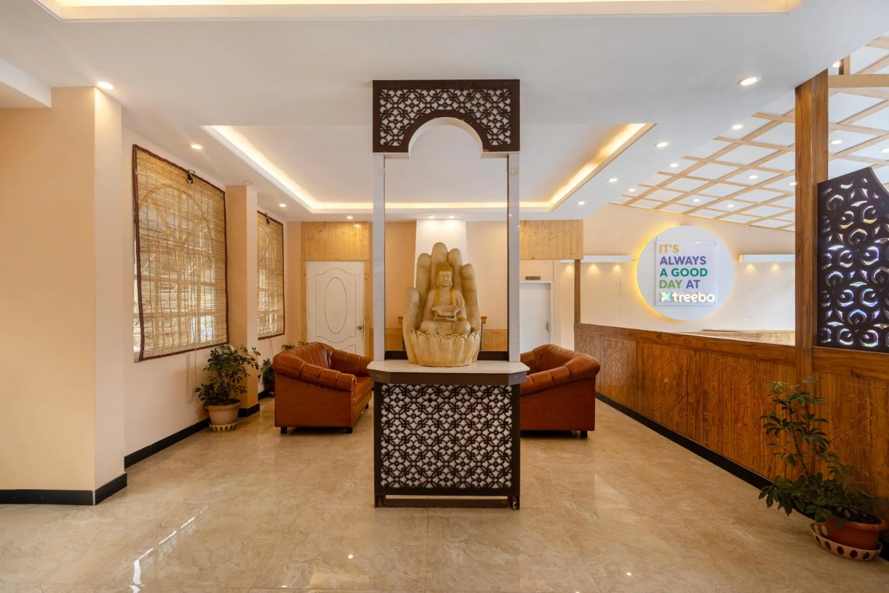 Seating area in Treebo Lords Garden Glory With Centralised Heating