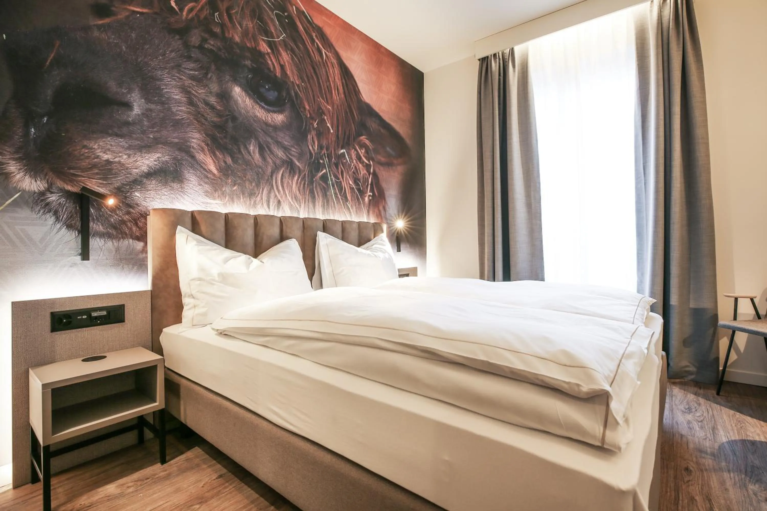 Bed in Adaastra Boutique Hotel