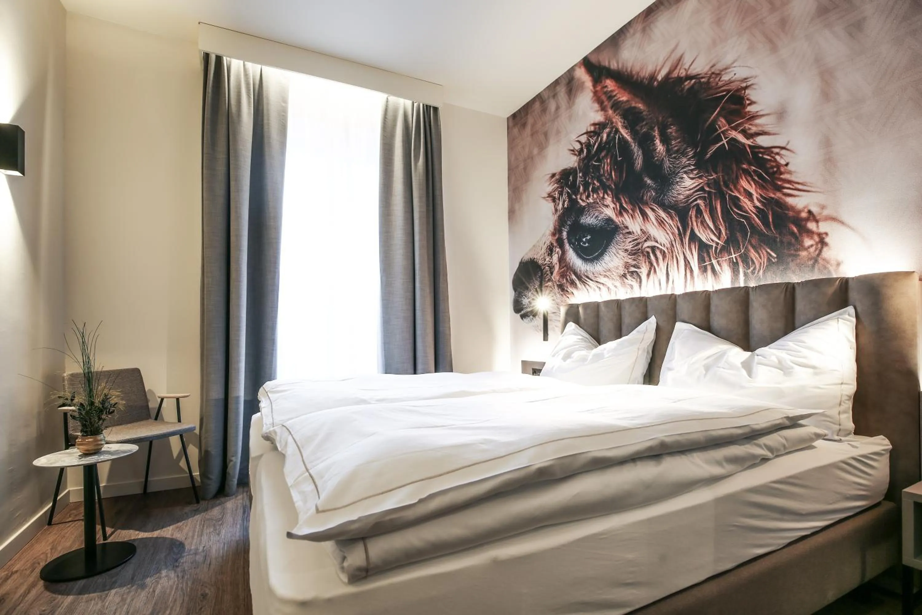 Bed in Adaastra Boutique Hotel