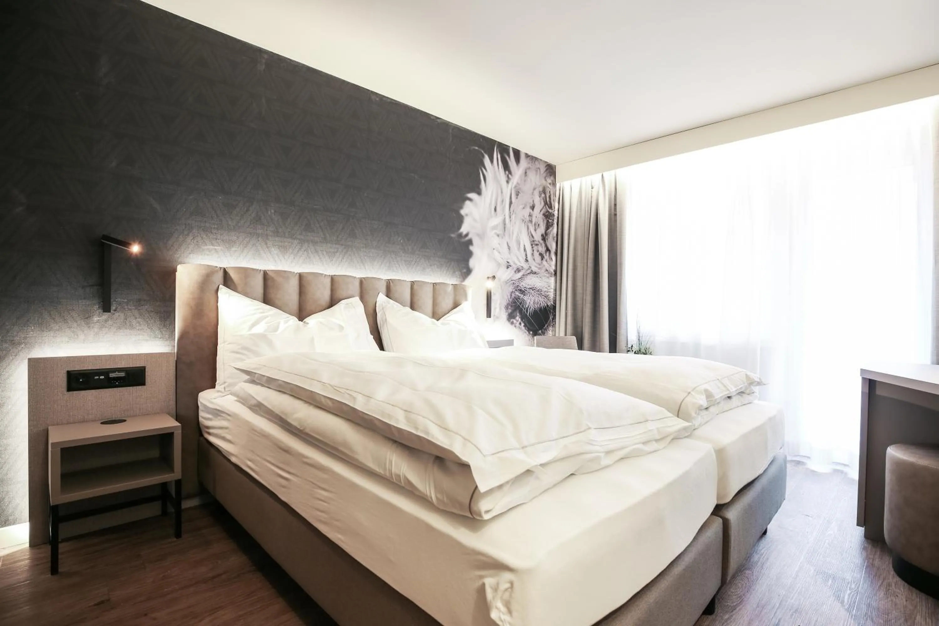 Bed in Adaastra Boutique Hotel