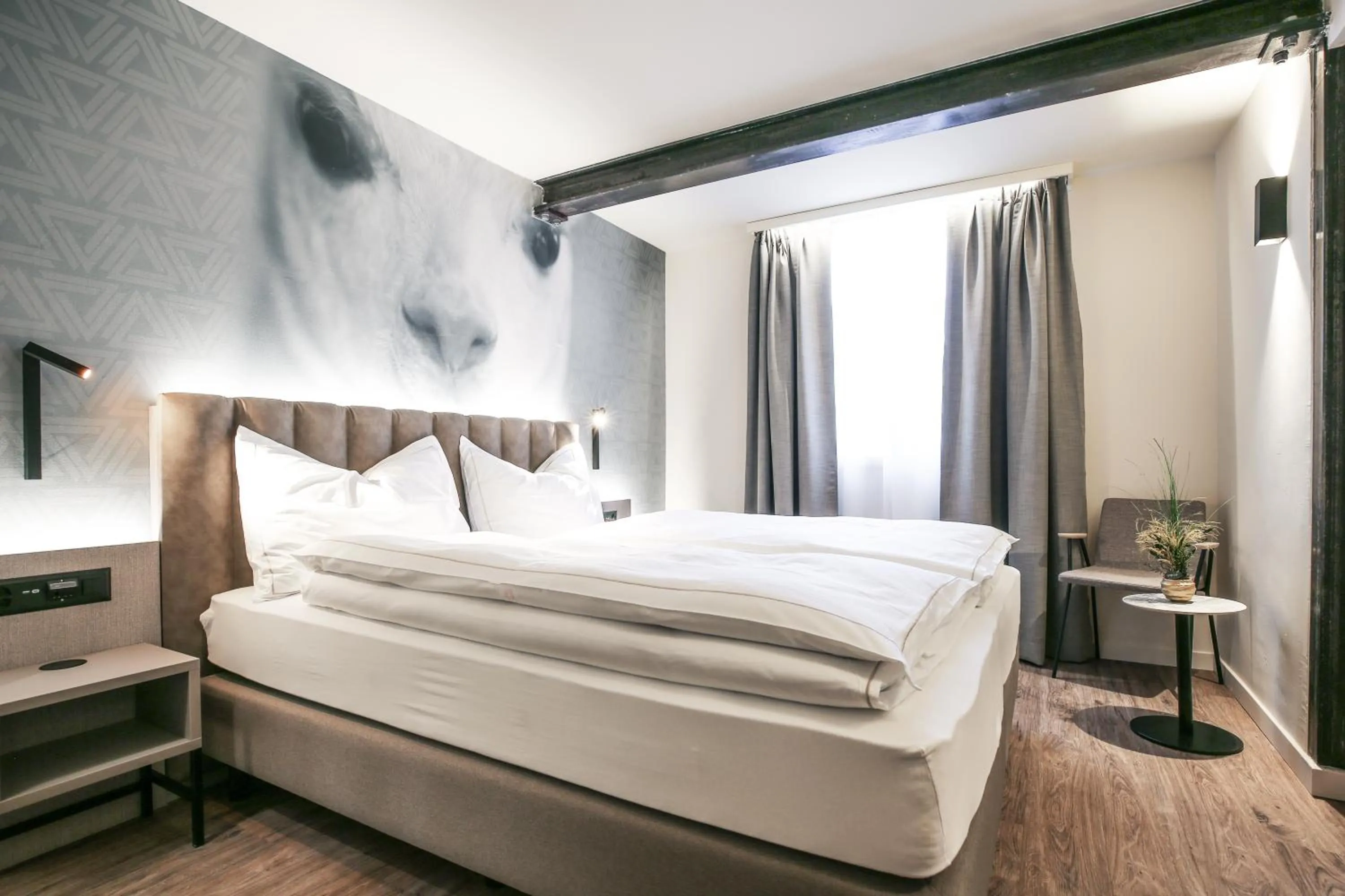 Bed in Adaastra Boutique Hotel