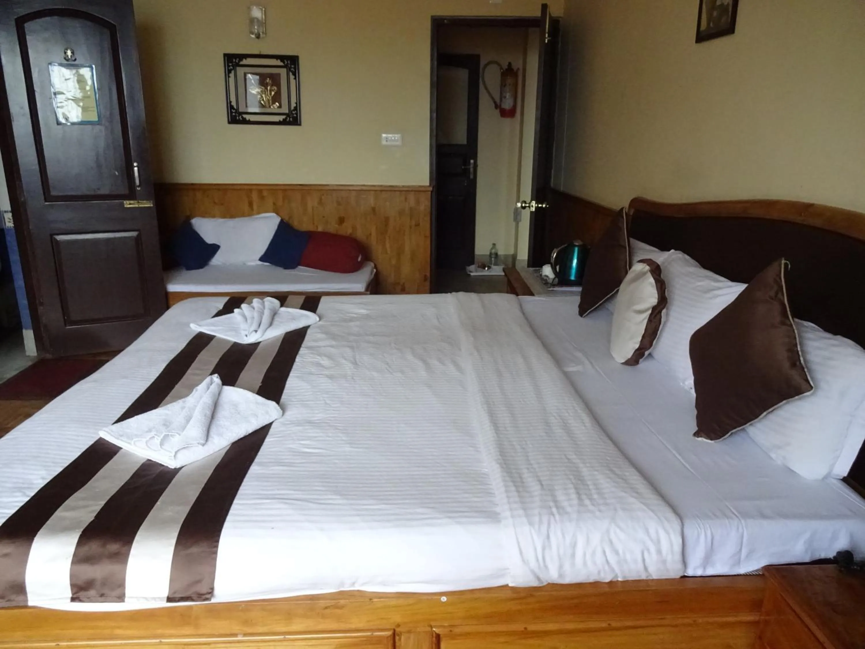 Bed in Jain Group Hotel Royal Residency