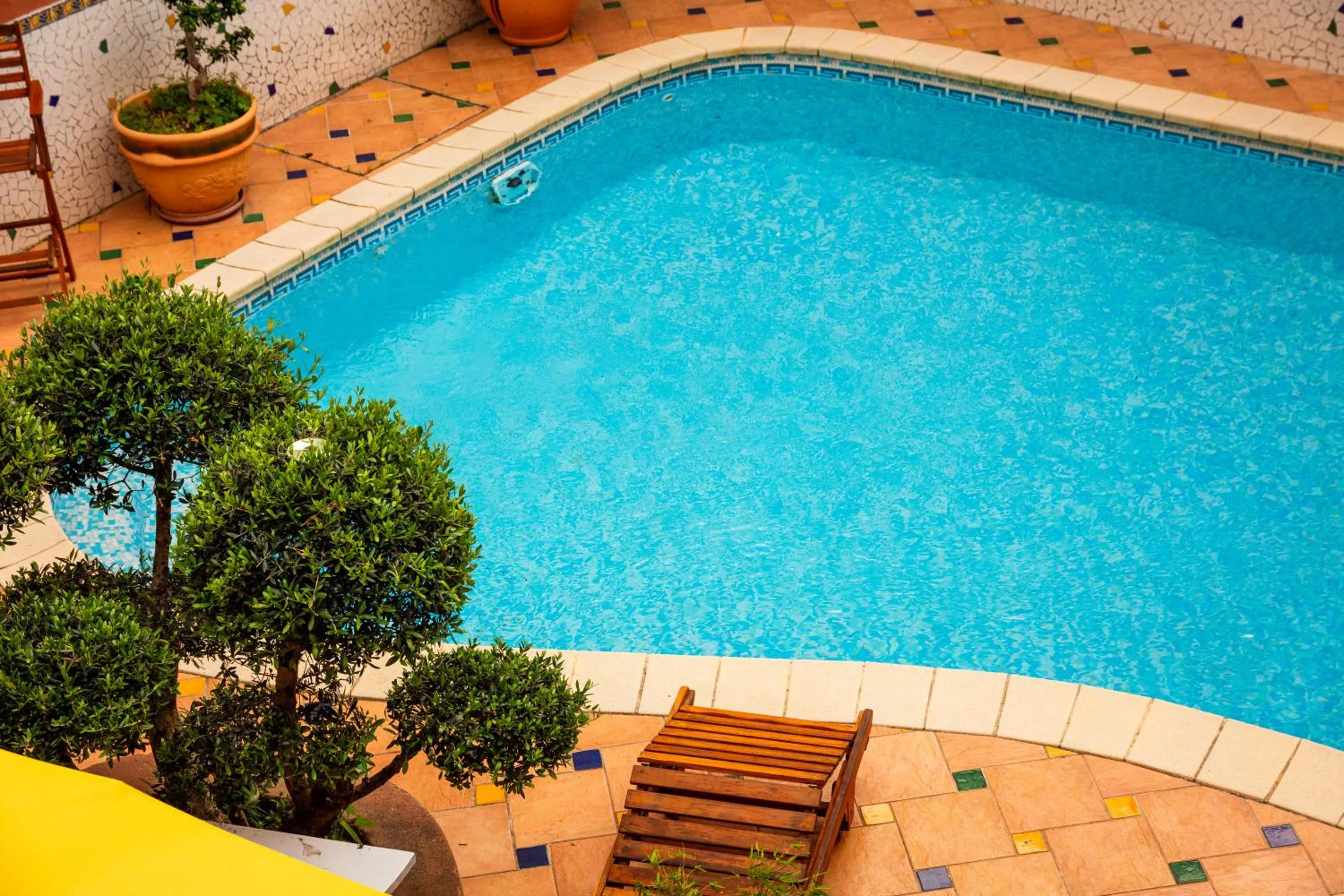 Pool view in Logis Hôtel Restaurant de la Paix