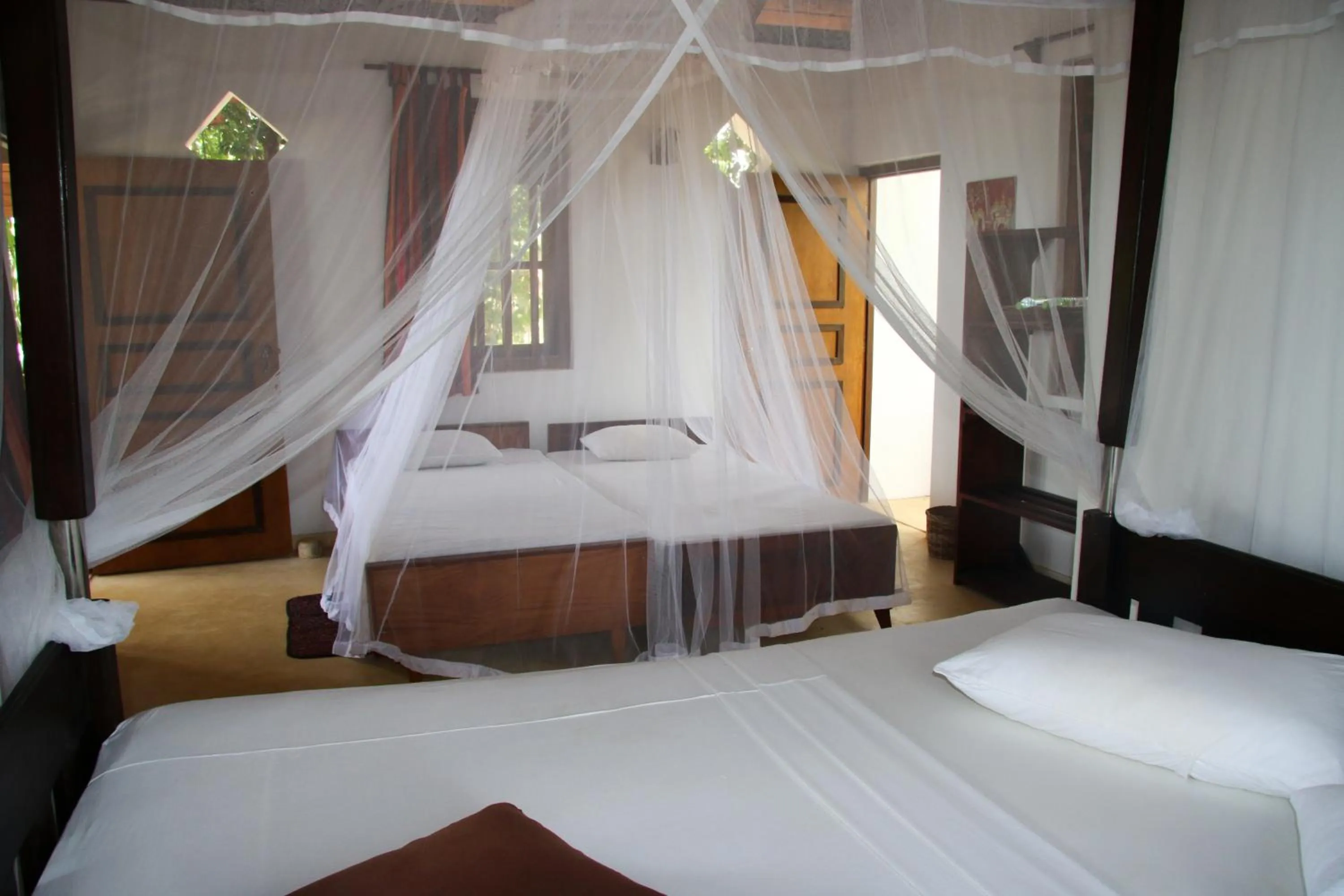 Bed in Shiva's Beach Cabanas