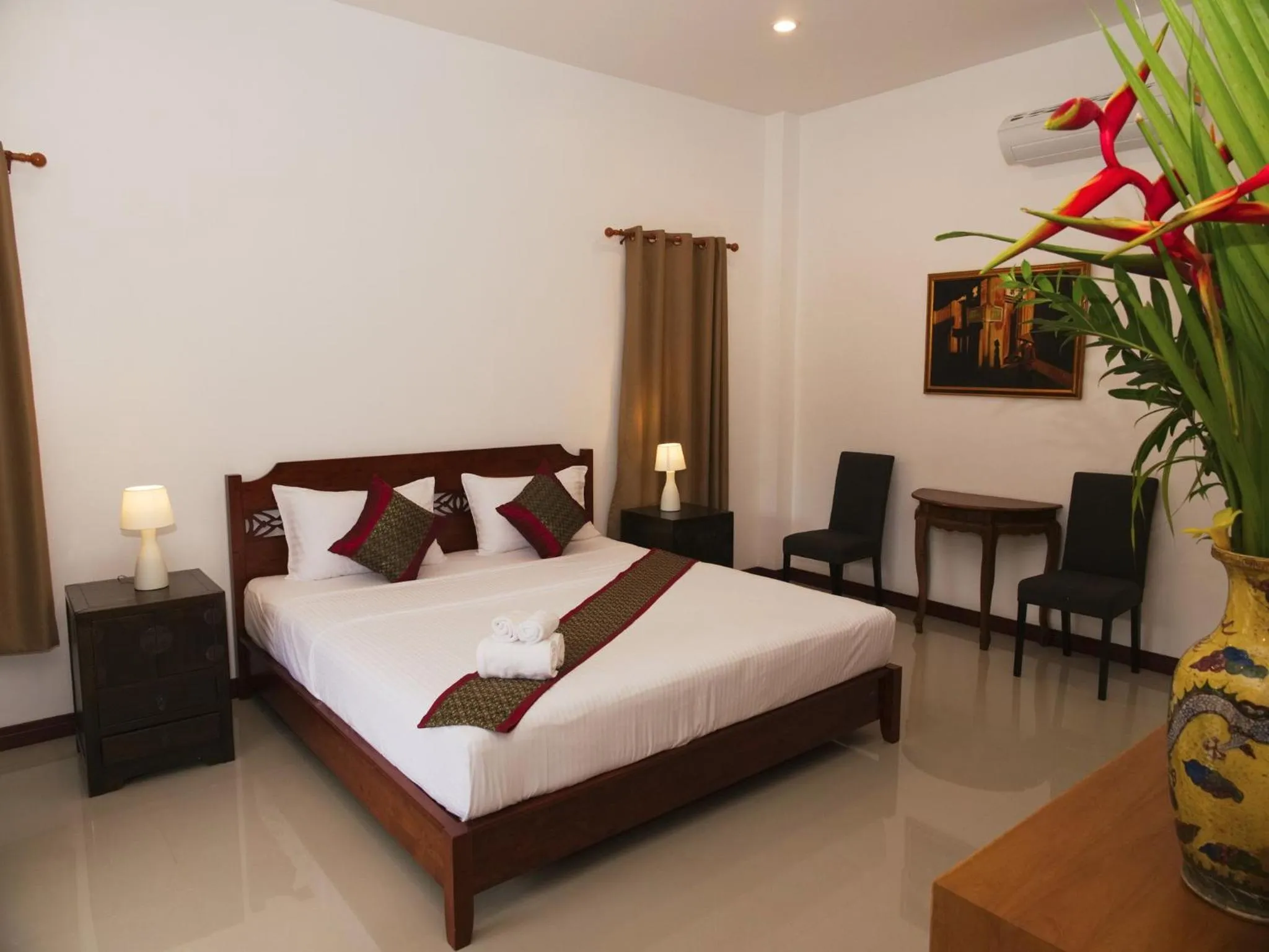 Photo of the whole room, Bed in Chanapha Residence