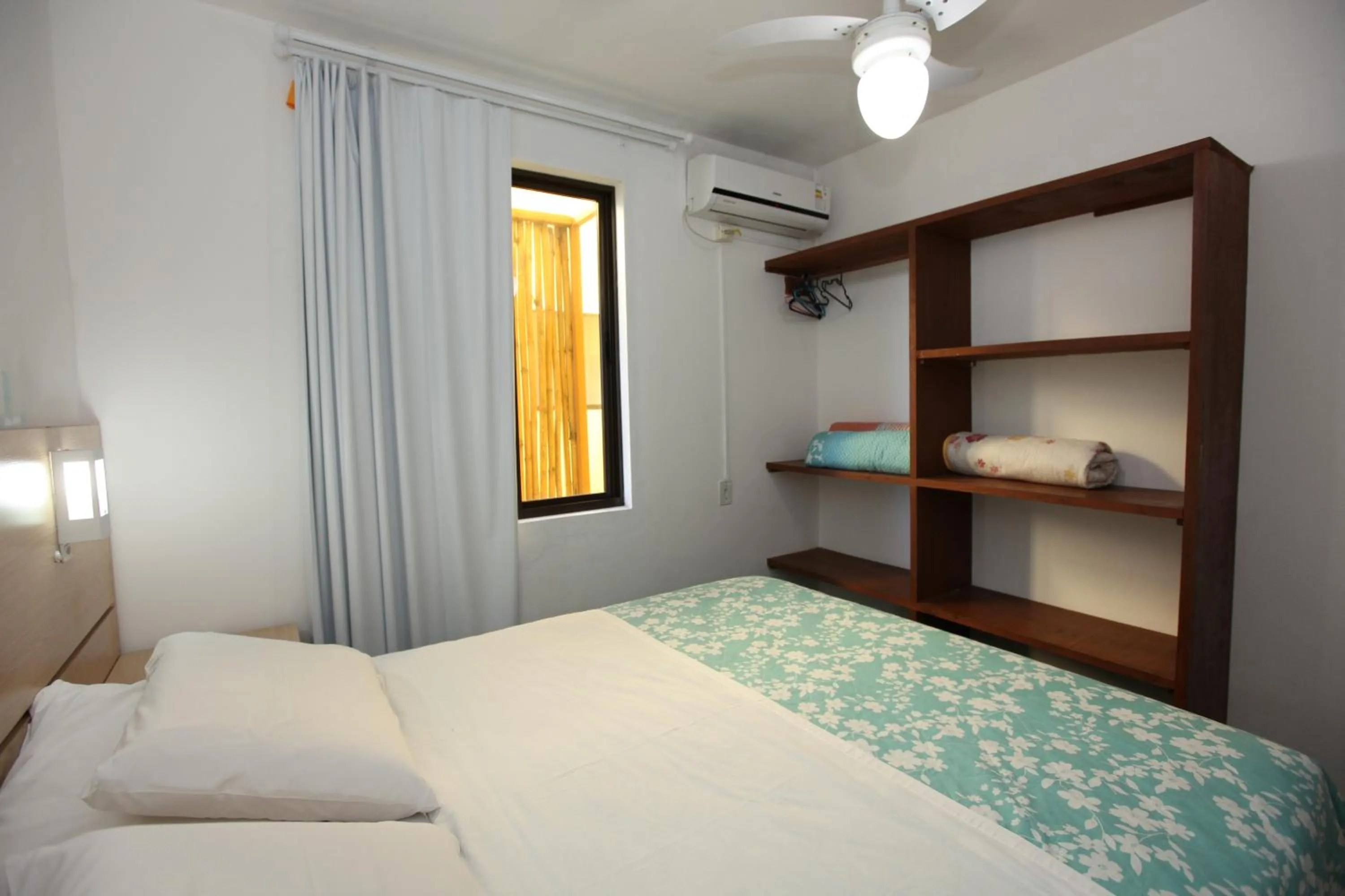 Photo of the whole room, Bed in Pousada Hibisco