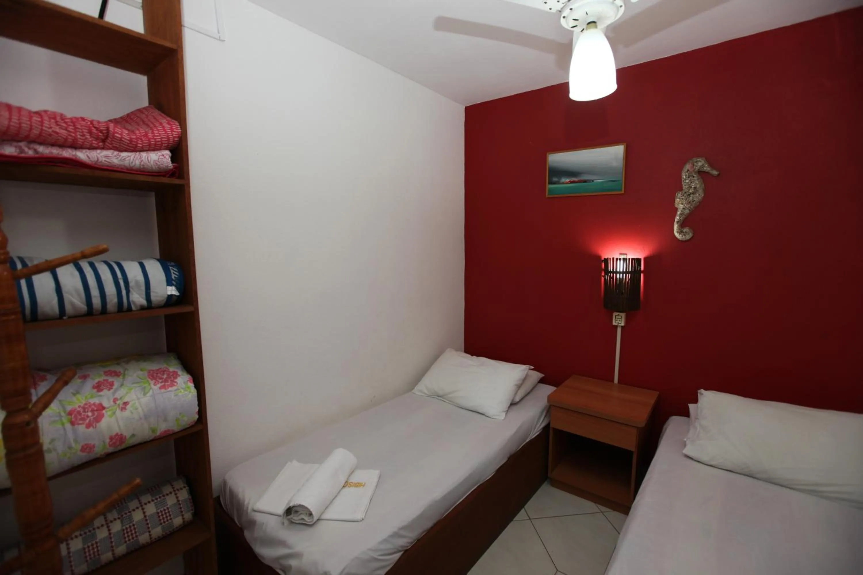 Photo of the whole room, Bed in Pousada Hibisco