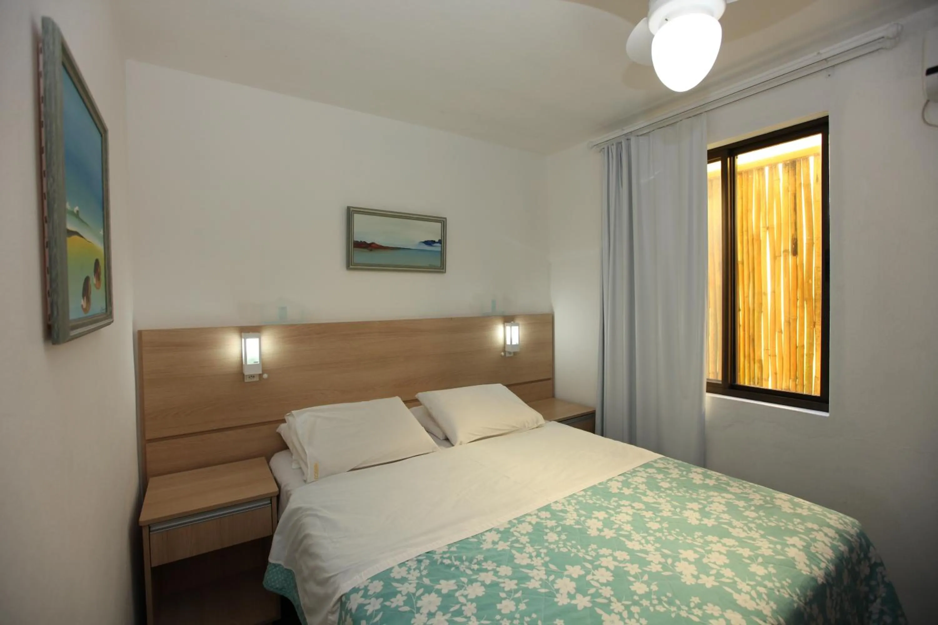 Photo of the whole room, Bed in Pousada Hibisco