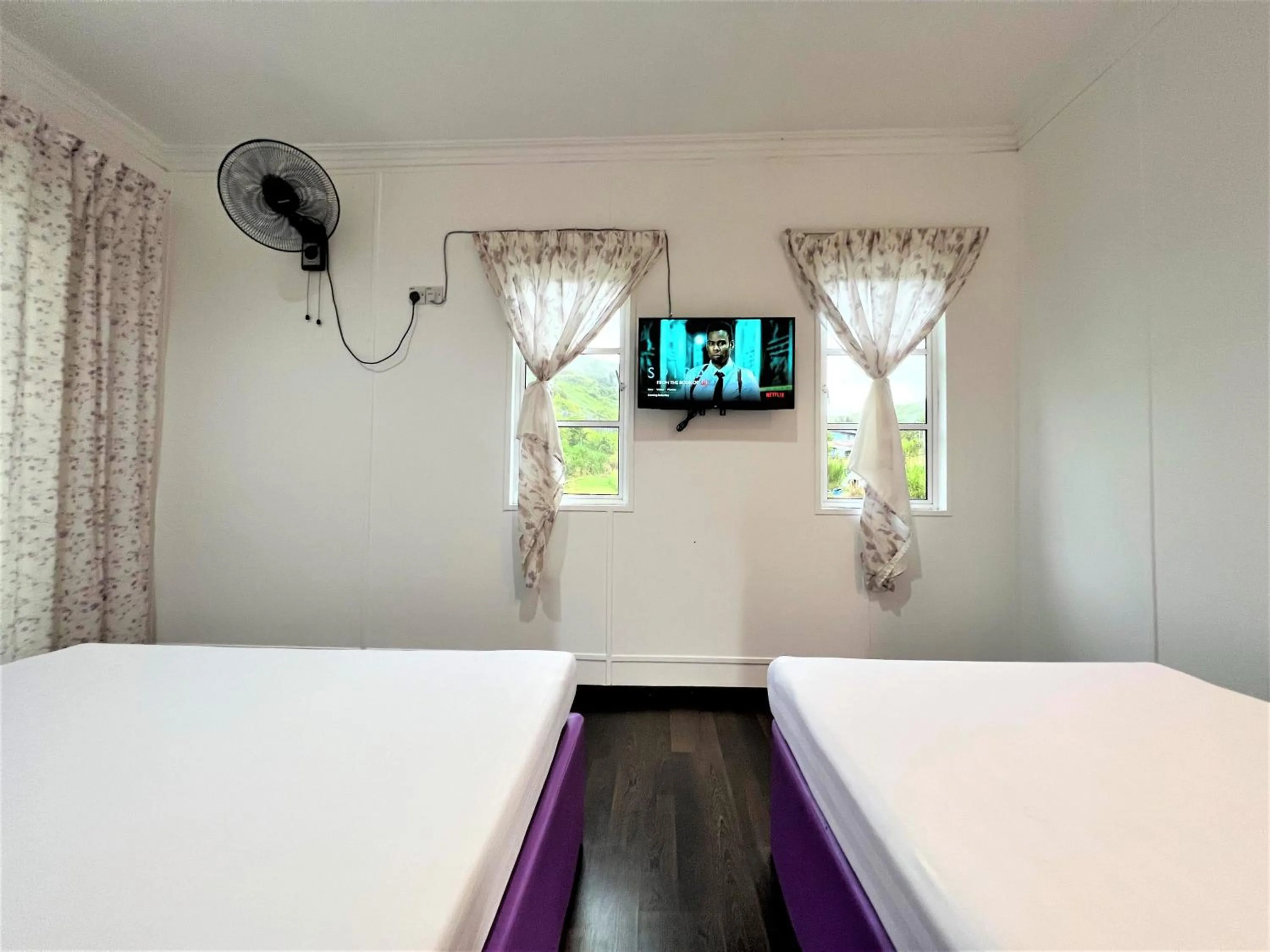 Bed in Suang Noh Homestay Kundasang