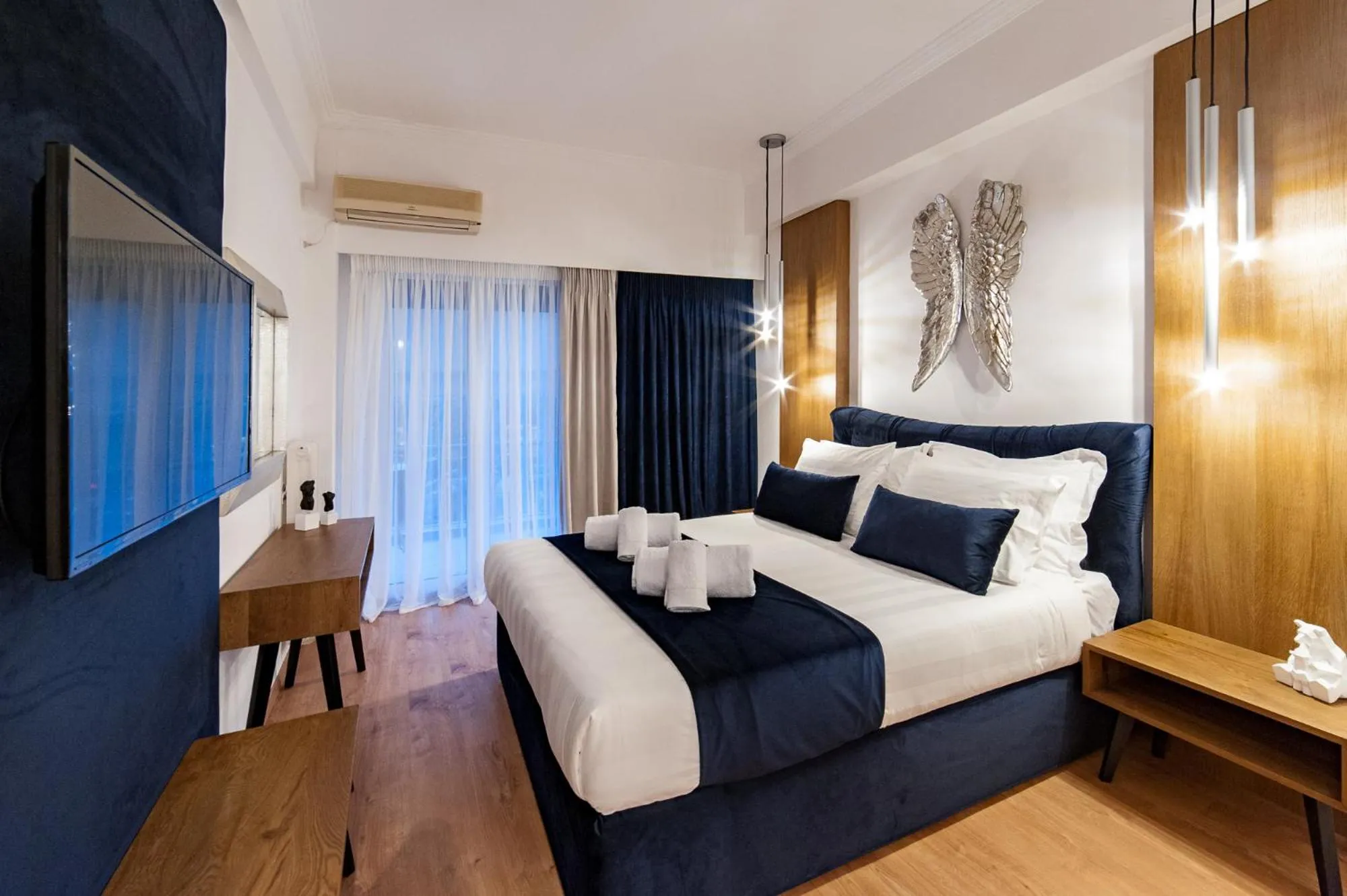Bed in Acropolis View Deluxe Penthouse & Luxury Apartments
