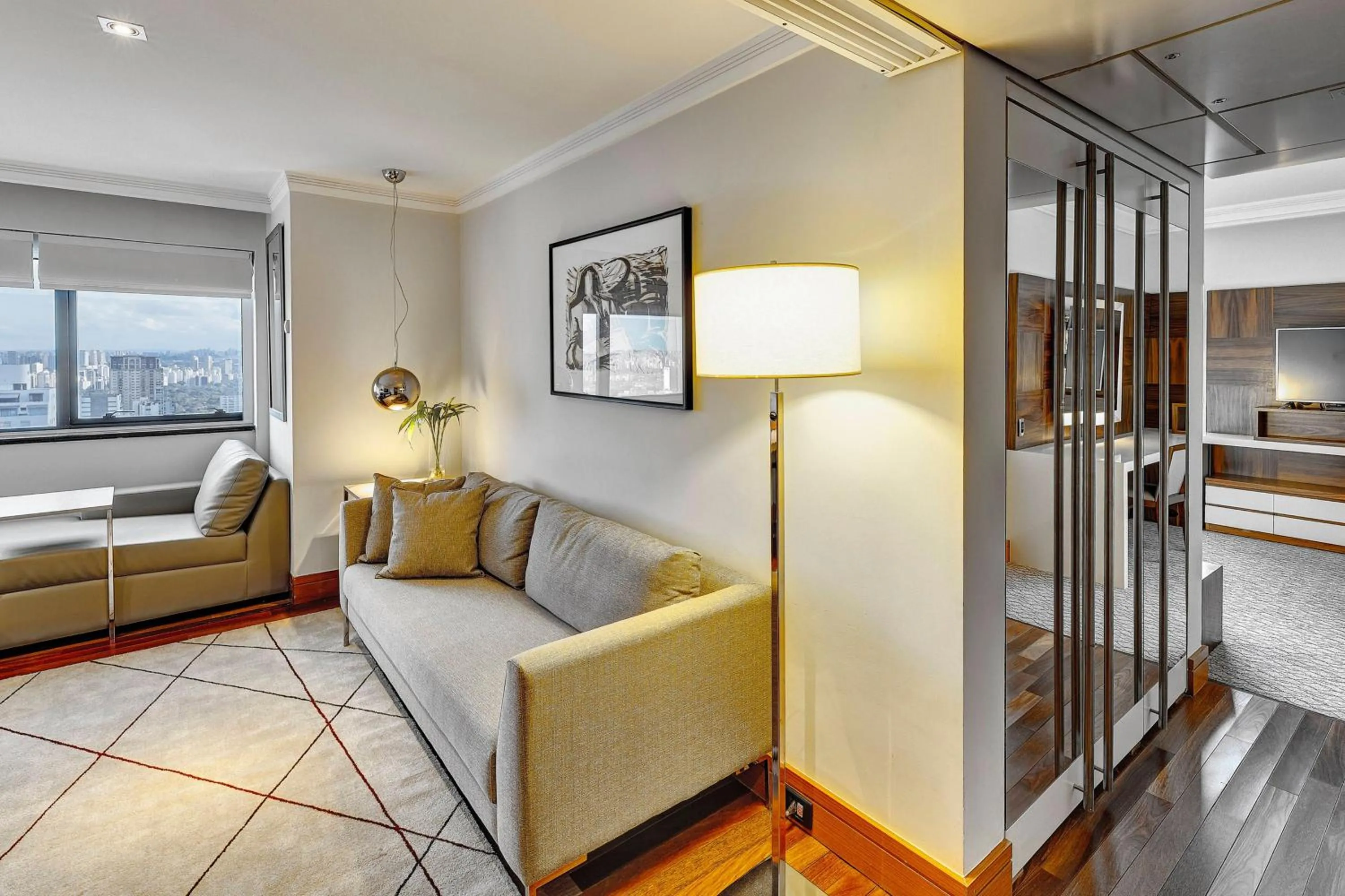 Living room, Bed in Renaissance São Paulo Hotel