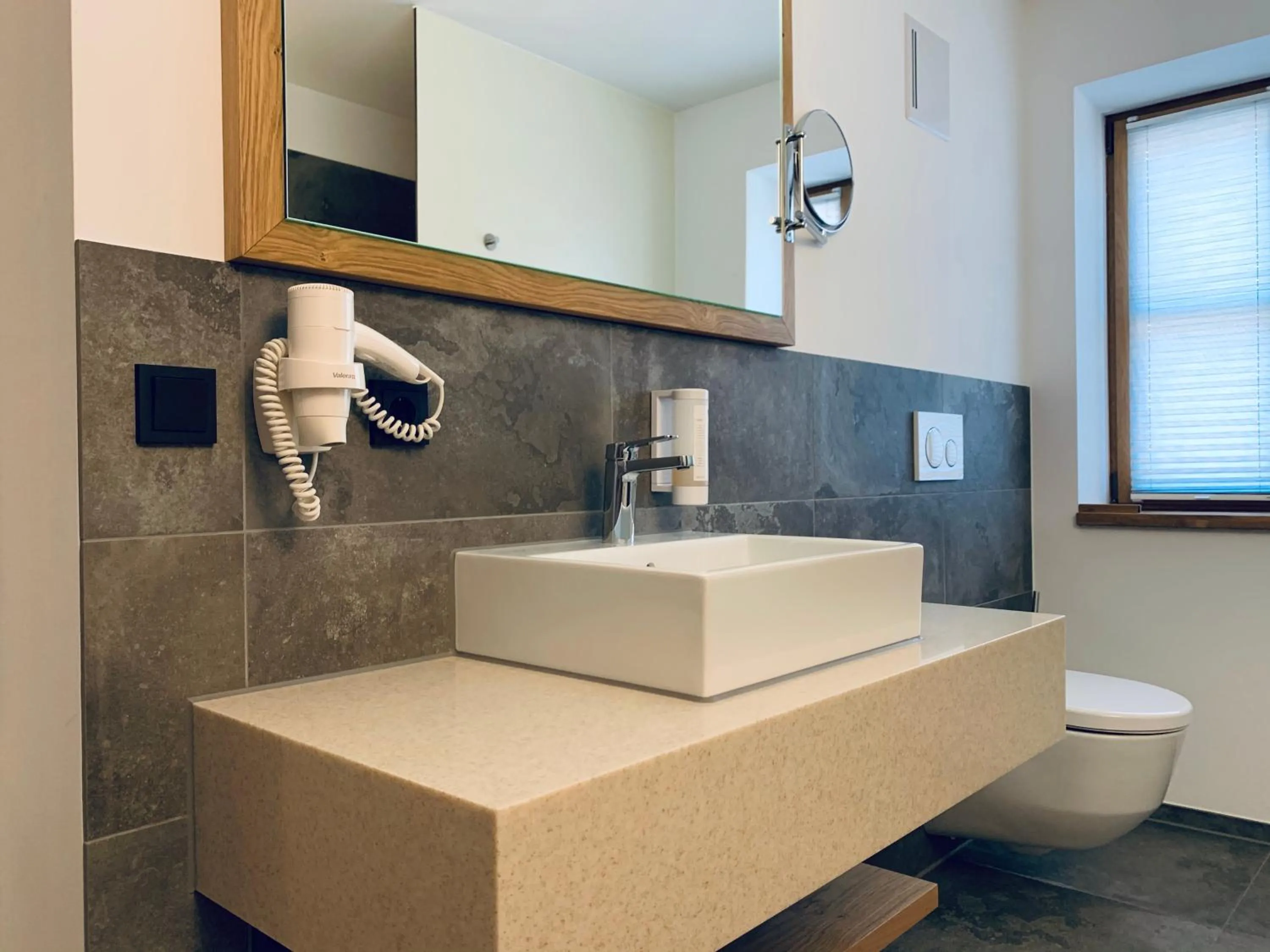 Bathroom in Stadthotel Kachelofen