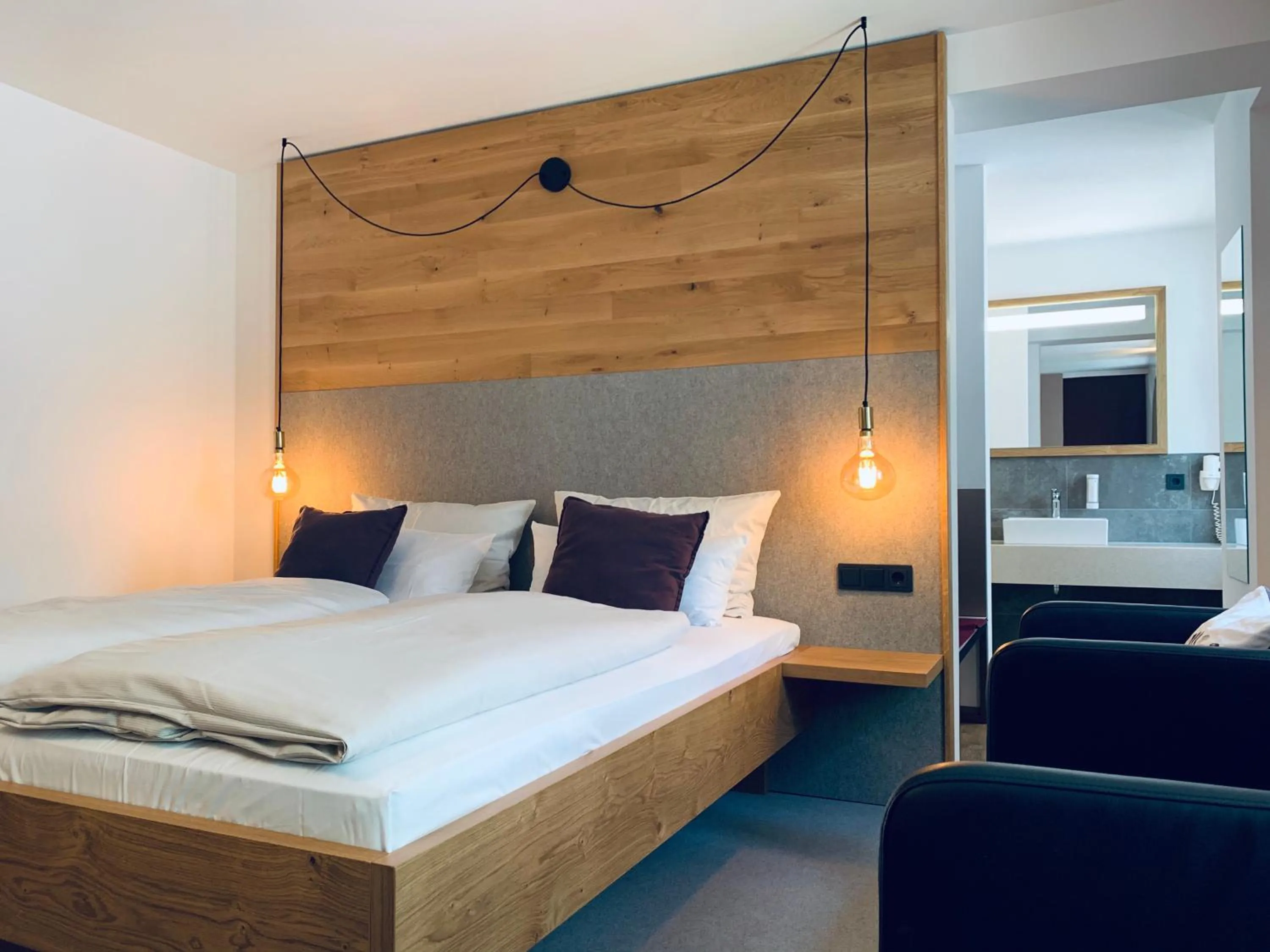 Bedroom, Bed in Stadthotel Kachelofen