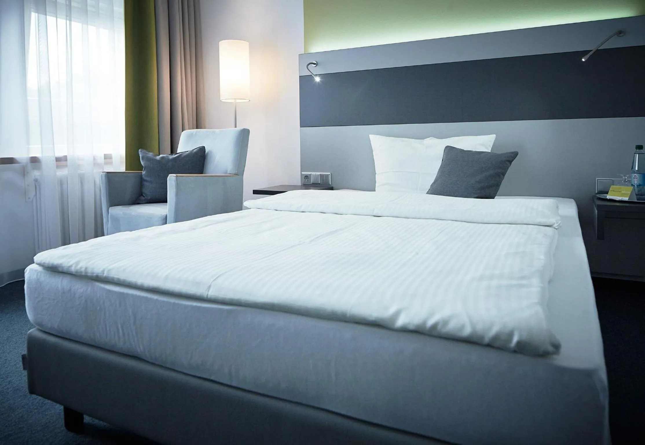 Photo of the whole room, Bed in bfwhotel und Tagungszentrum