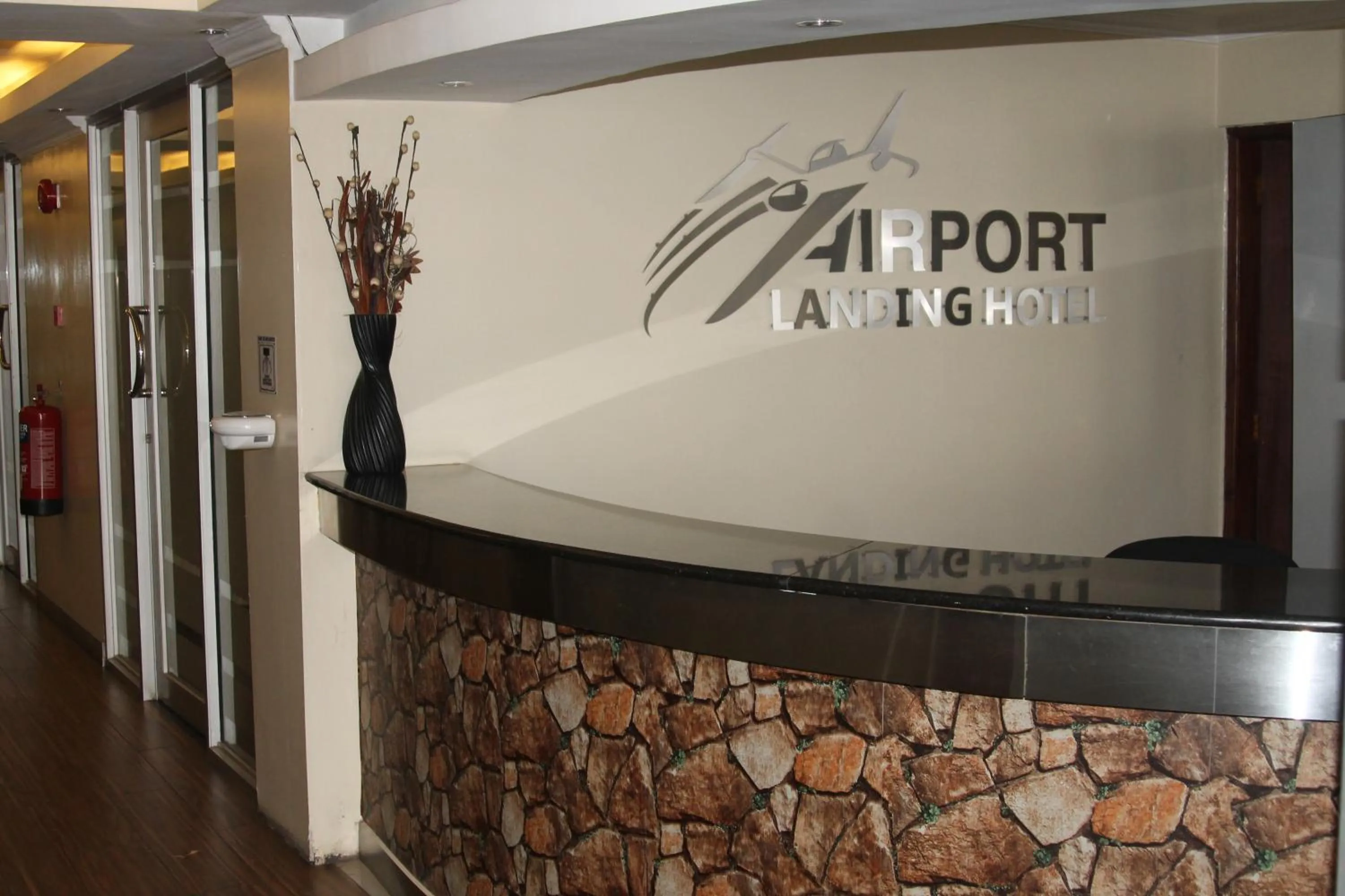 Lobby or reception in Airport Landing Hotel