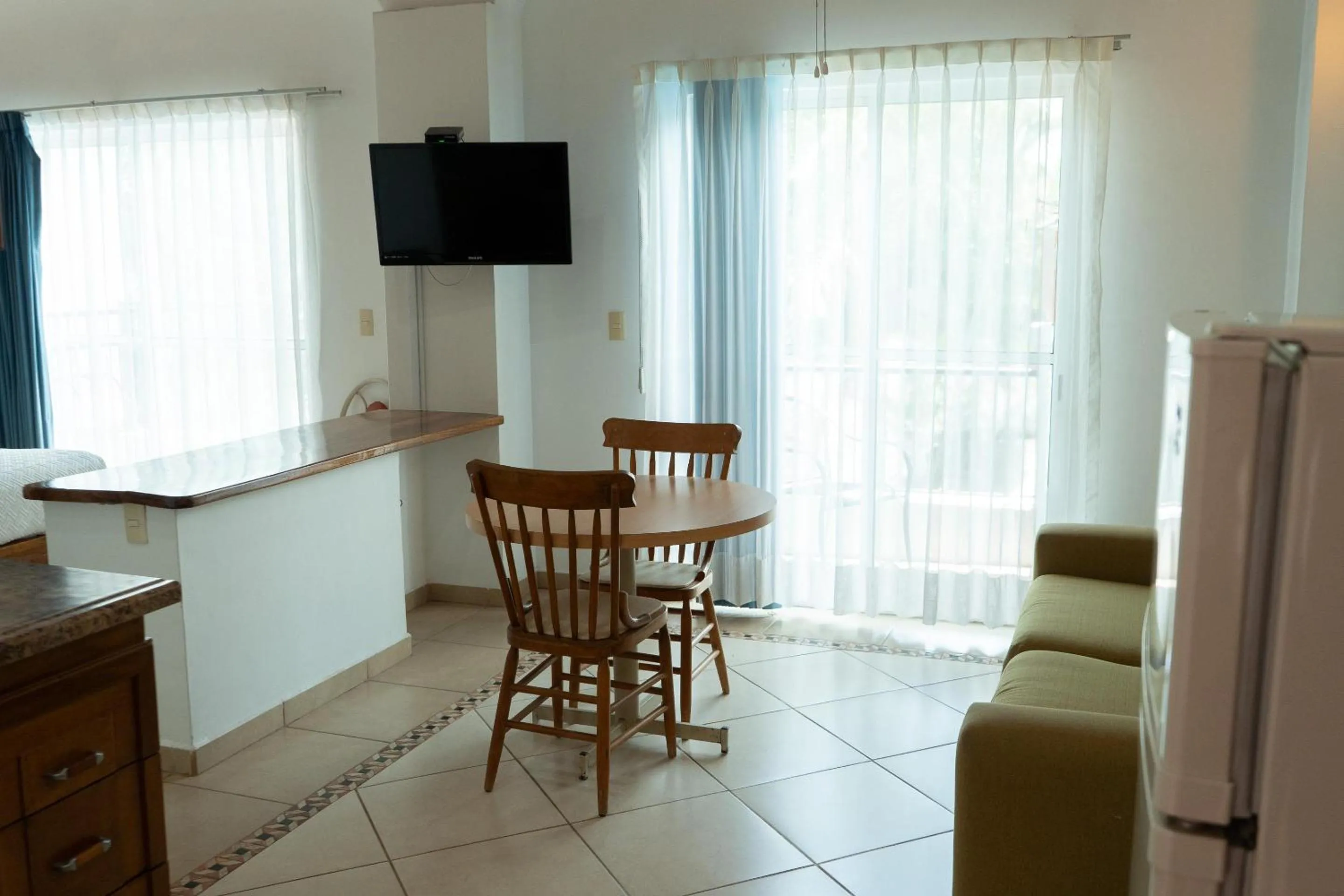 Bedroom in Capital O La Joya Del Lago