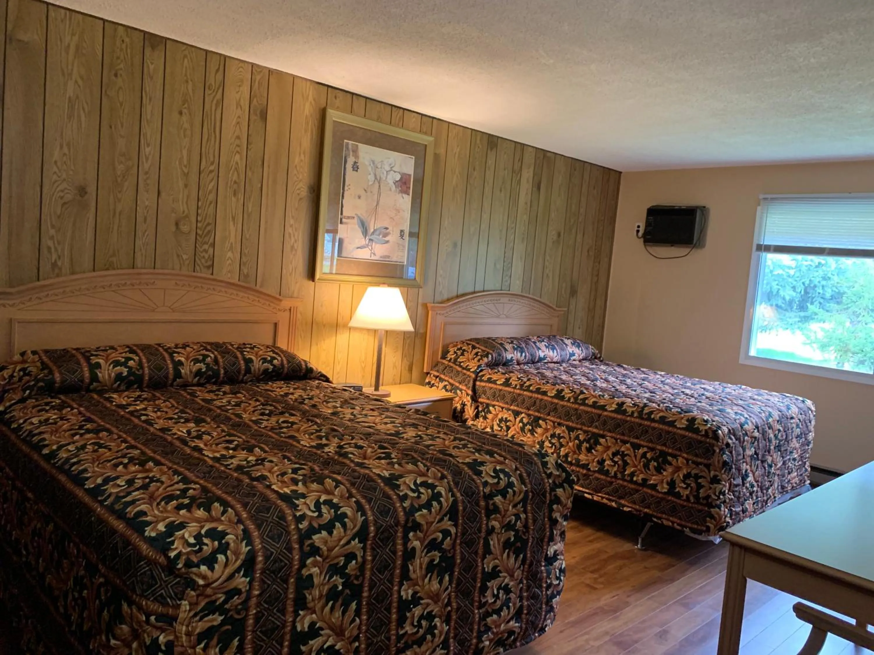 Bed in Green View Motel and RV Park