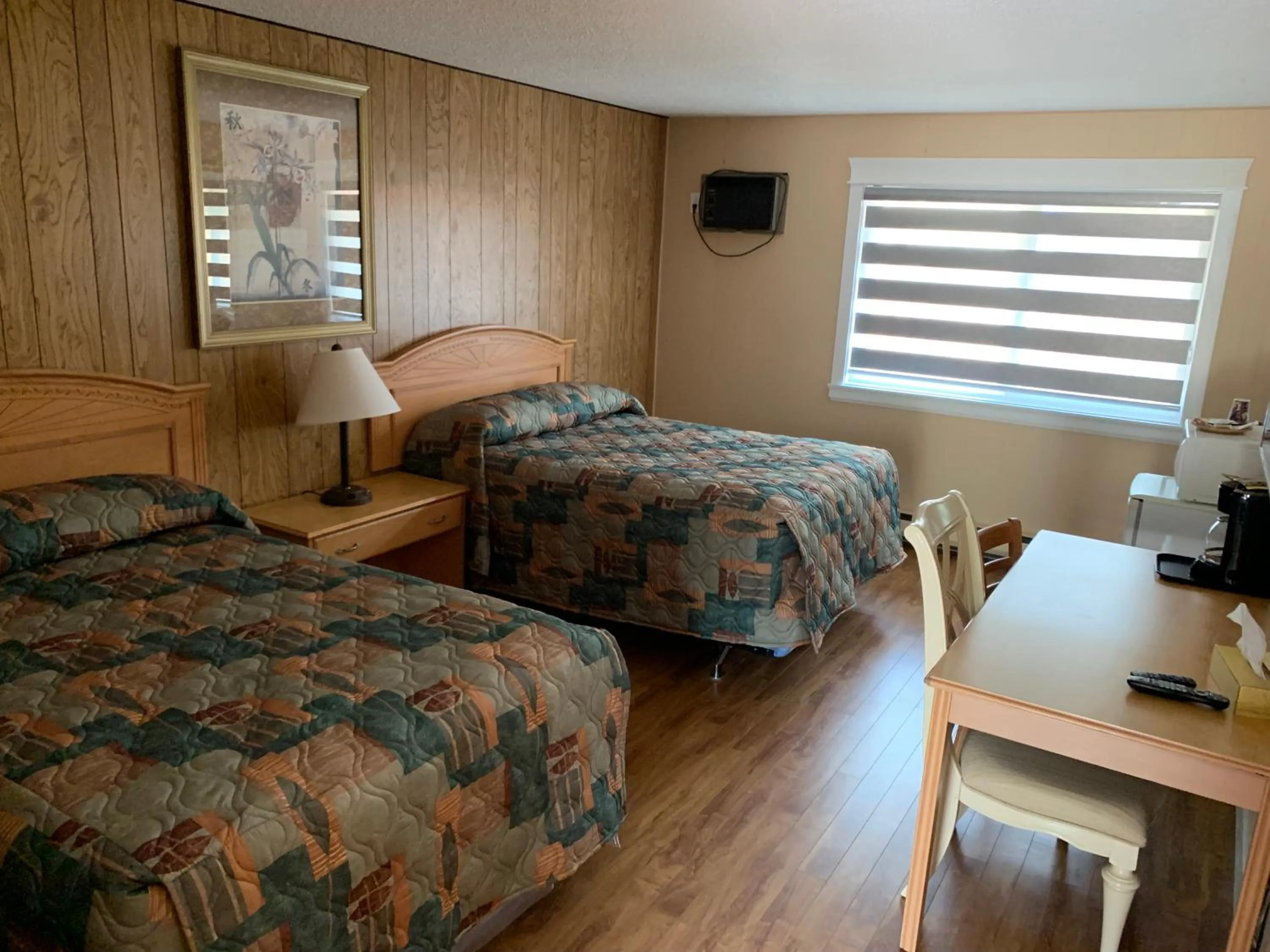 Bed in Green View Motel and RV Park